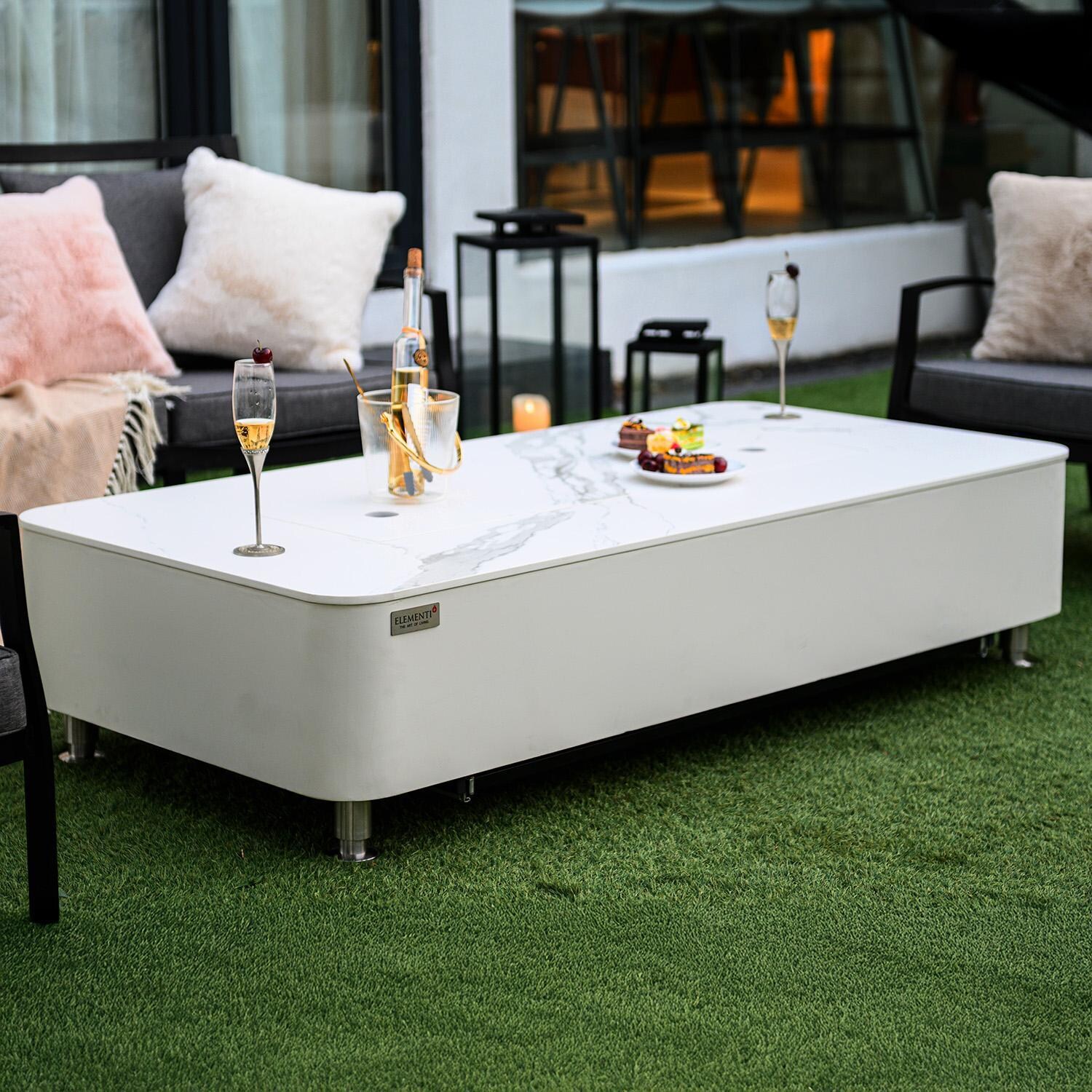 Elementi Athens 30-Inch Rectangle Porcelain Top Natural Gas Fire Pit Table - White - With Lid - Lifestyle thumbnail