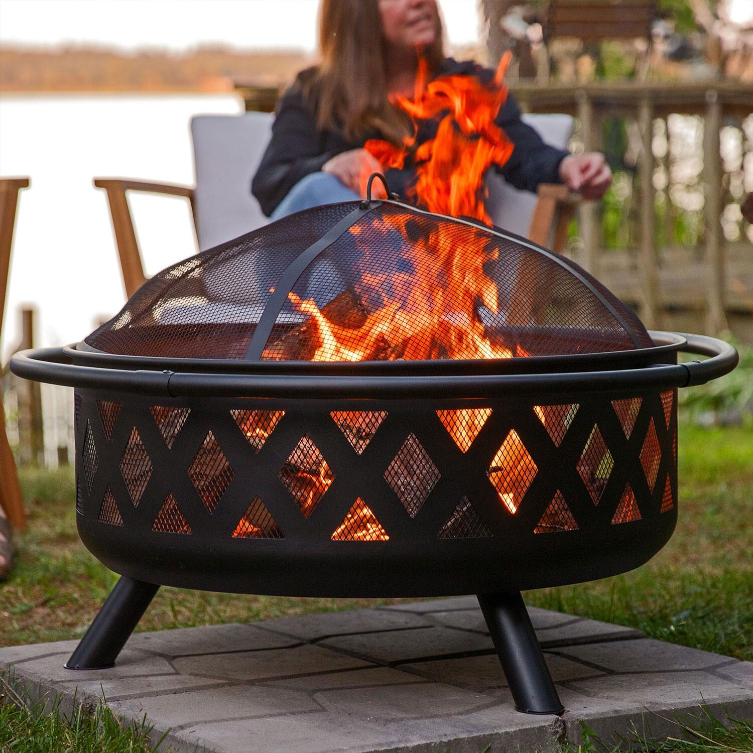 Ultimate Patio Crossweave 36 Inch Round Steel Wood-Burning Fire Pit in Black - Wood Flame Close-Up - Detail thumbnail