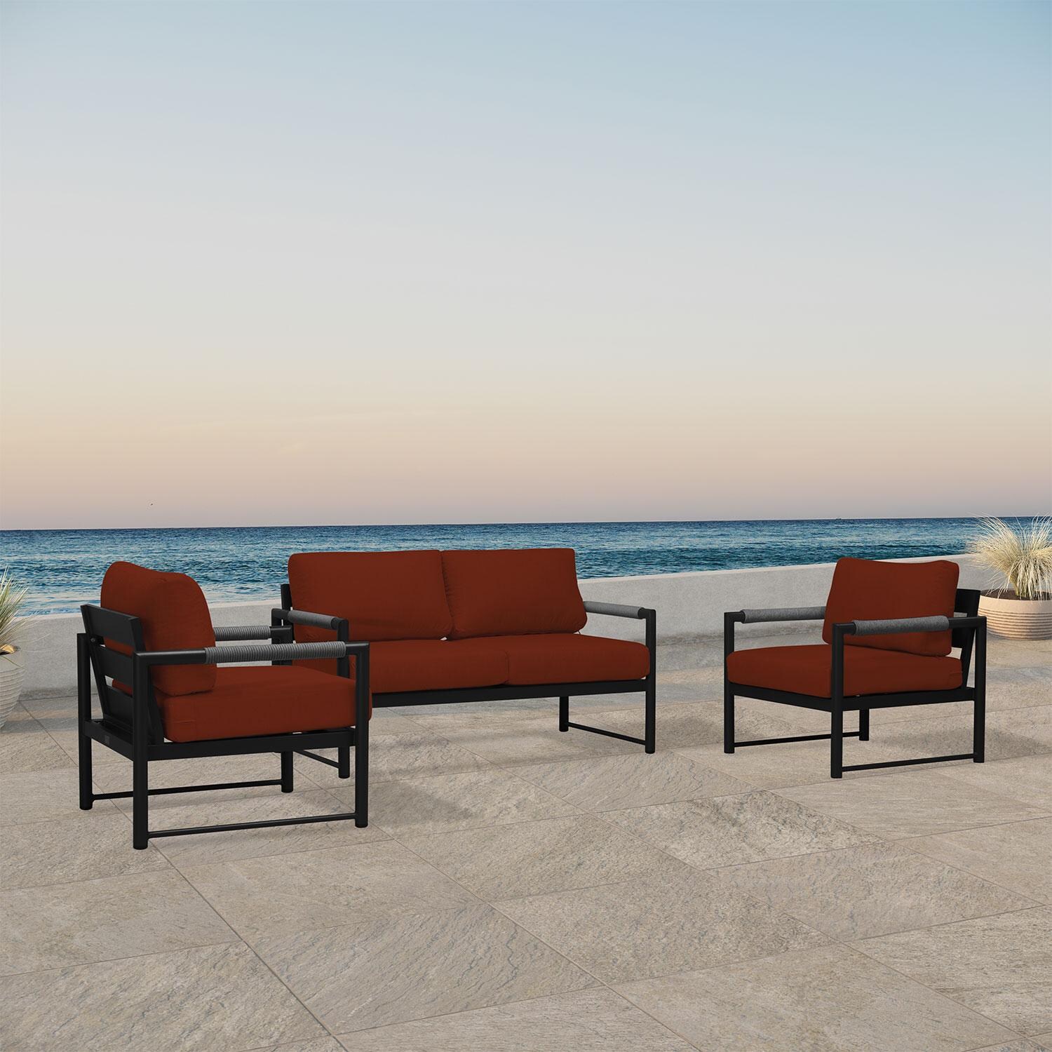 Lakeview AVEBAY-BK-CO-SET120-HN Avenue Bay Black/Carbon 3 Pc Loveseat Set - Canvas Henna - Angled On Patio - Lifestyle thumbnail