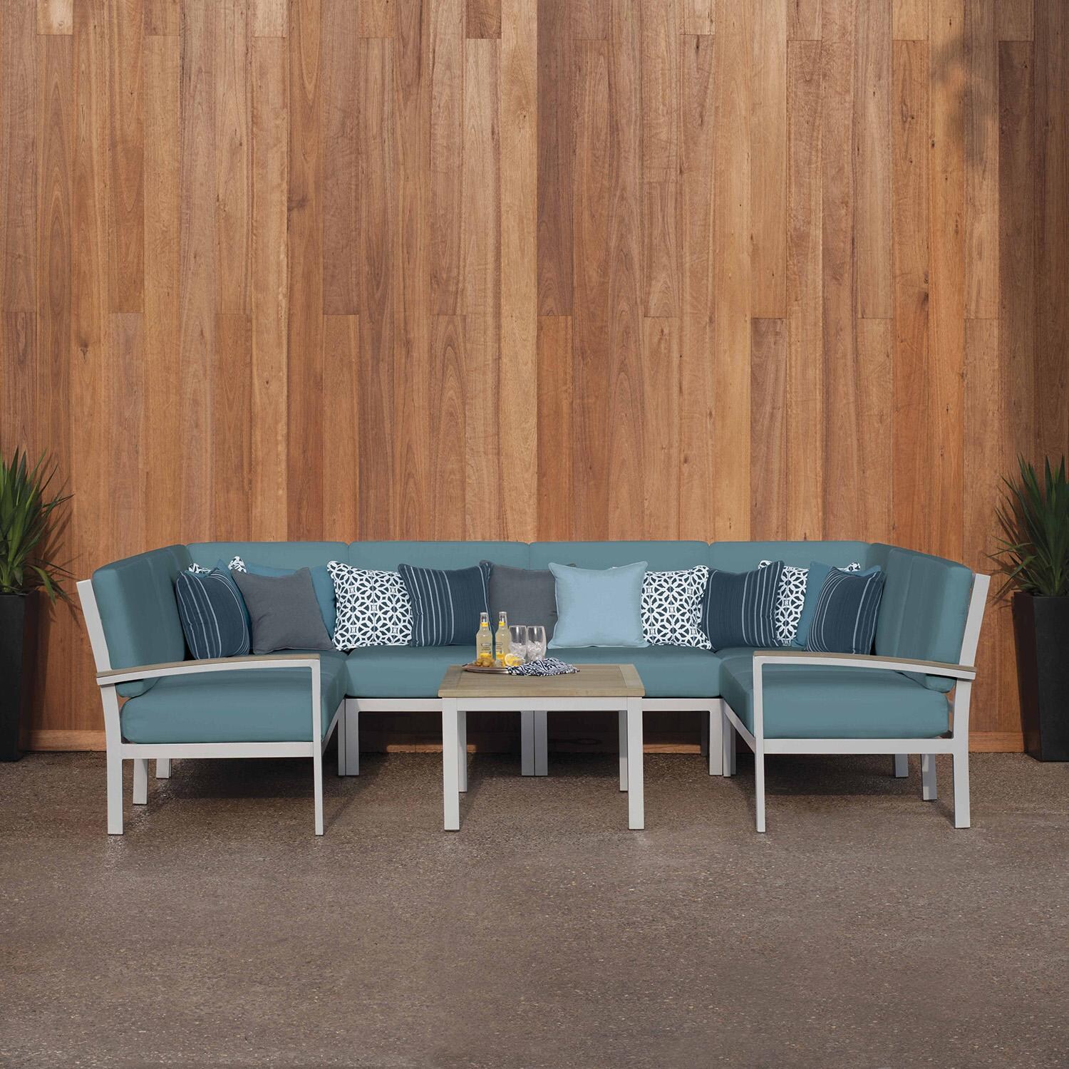 Oxford Garden 5272-PC.F Travira 7 Pc Aluminum Seating Set w/ Coffee Table in Vintage Tekwood/ Ice Blue by Oxford Garden - On Patio - Lifestyle thumbnail