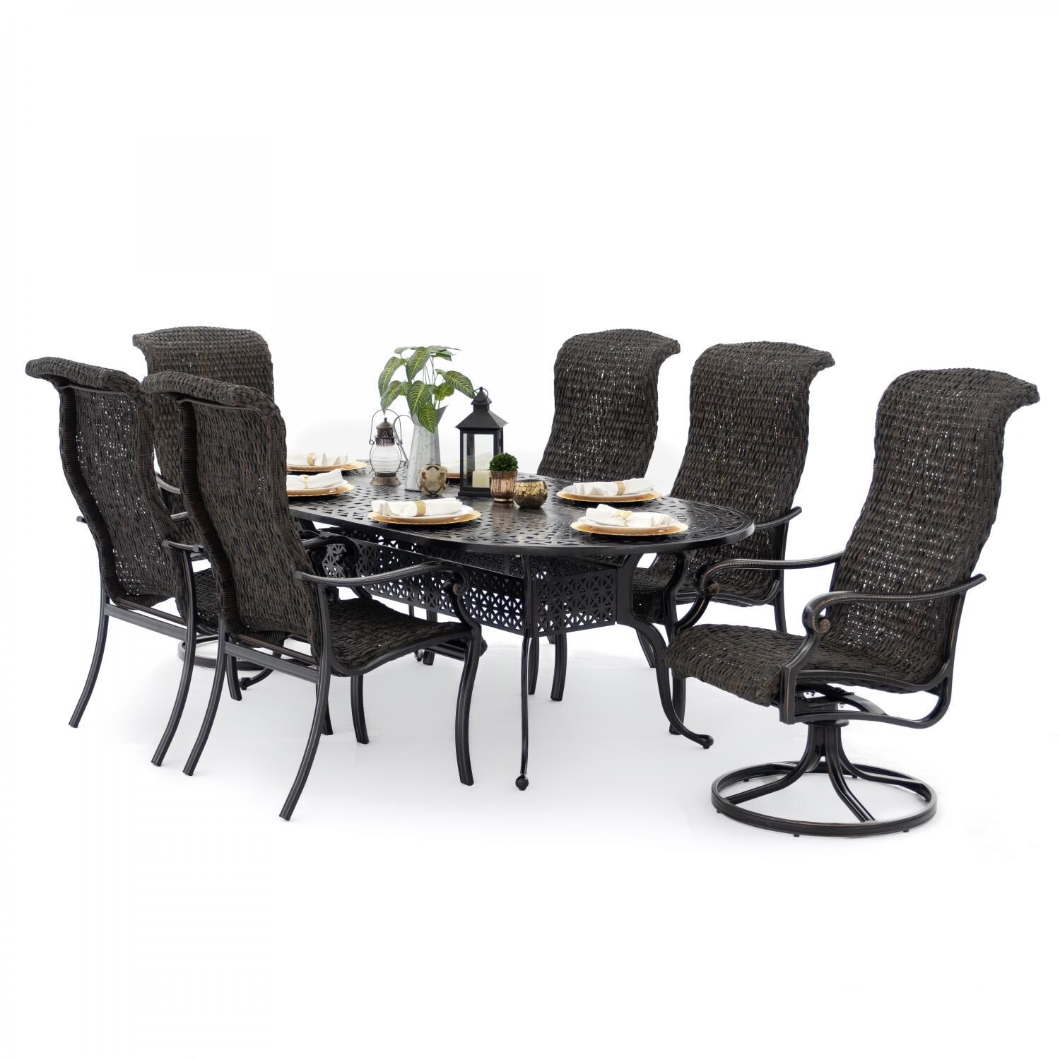 Du Monde 7 Piece Banana Leaf Wicker Patio Dining Set W/ 84 X 42 Inch Oval Dining Table & 2 Swivel Rockers thumbnail