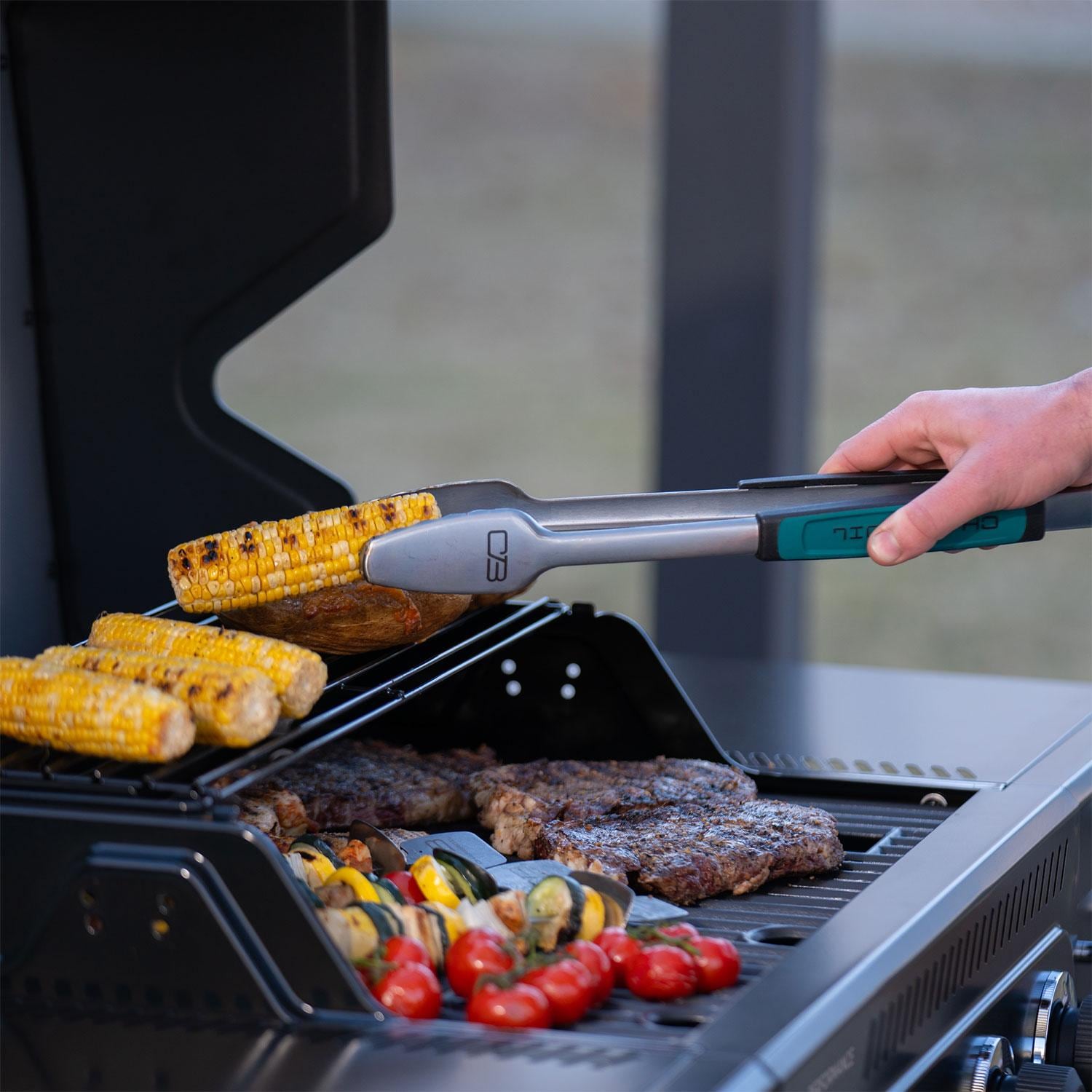 Charbroil 463348825 Performance Series 4-Burner Propane Grill A-Frame Cart - Black & Stainless Steel - Grilling Food - Lifestyle thumbnail