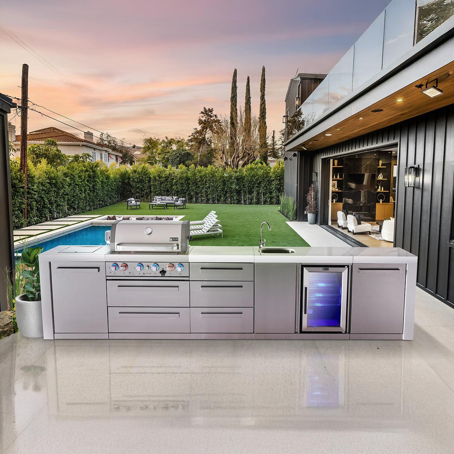 Mont Alpi Deluxe Series 12 Ft Natural Gas Outdoor Kitchen Island w/ 32-in Grill, Side Burner, Beverage Center & Triple Drawer (Ships Propane w/ Conversion Kit) - On Patio - Lifestyle thumbnail