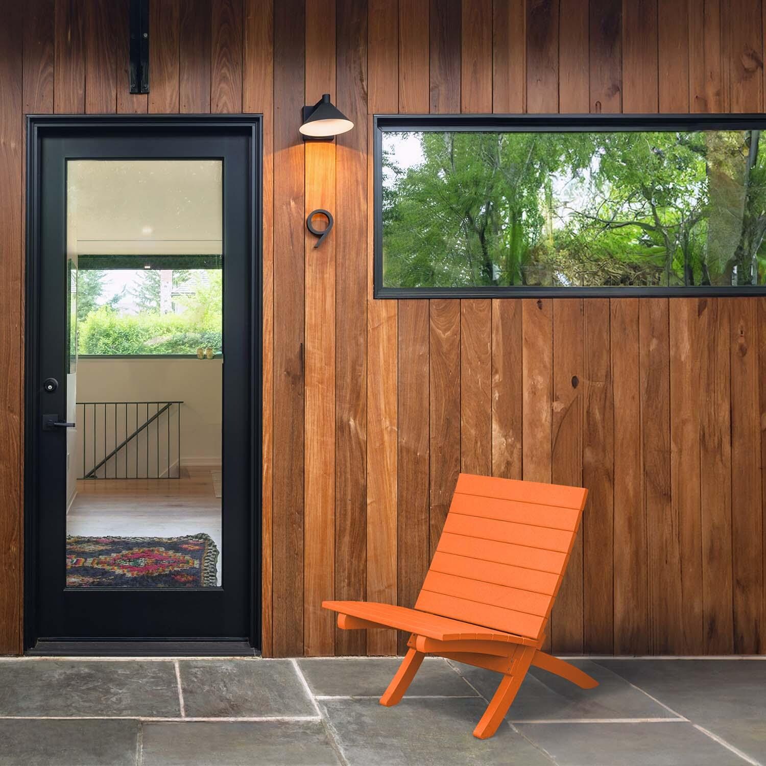 Hazel Cove Recycled Plastic Folding & Stacking Dining Side Chair in Citrus Orange by Lakeview Outdoor Designs - By Door - Lifestyle thumbnail