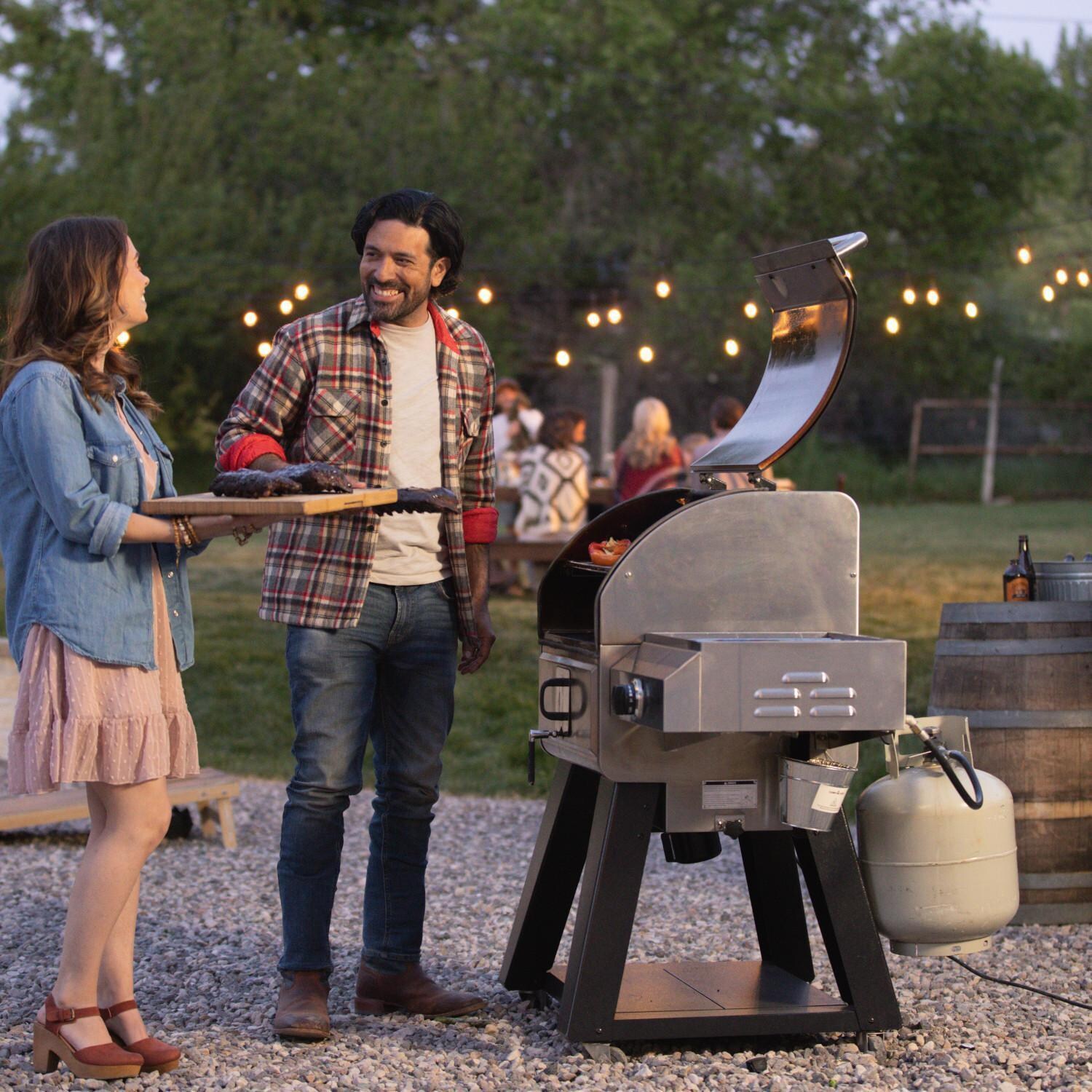 Camp Chef PG24WWSB0 Woodwind Pro WiFi 24 Inch Pellet Grill - Plate - Lifestyle thumbnail