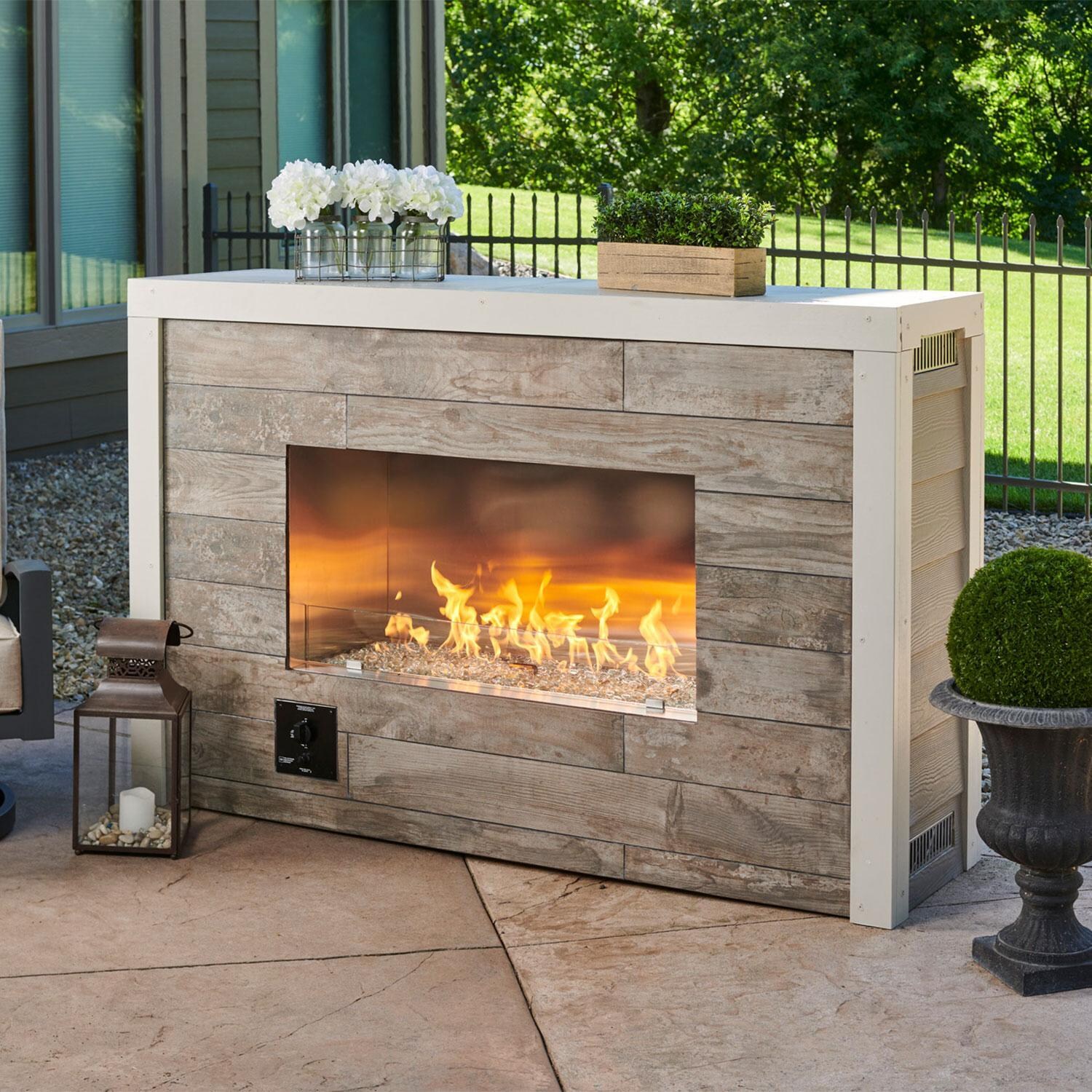 The Outdoor GreatRoom Company RLFP-72DLP 72-Inch Linear Ready-to-Finish Single-Sided Liquid Propane Fireplace W/ Direct Spark Ignition - Back Patio - Lifestyle thumbnail