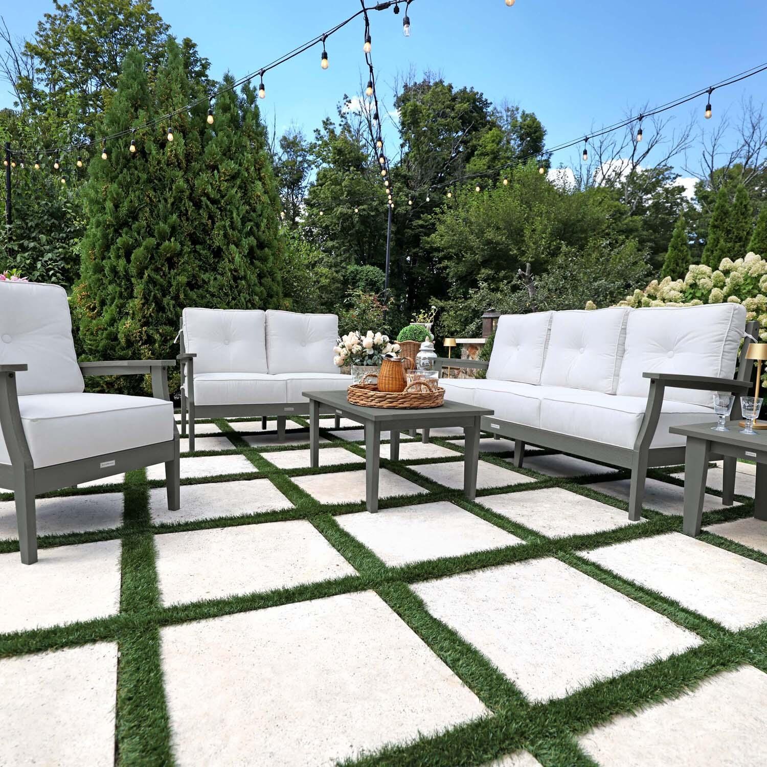 Blushing Bay 6 Pc Recycled Plastic Grand Seating Set in Bliss Linen/Coastal Teak by Lakeview Outdoor Designs - Front View - Lifestyle thumbnail