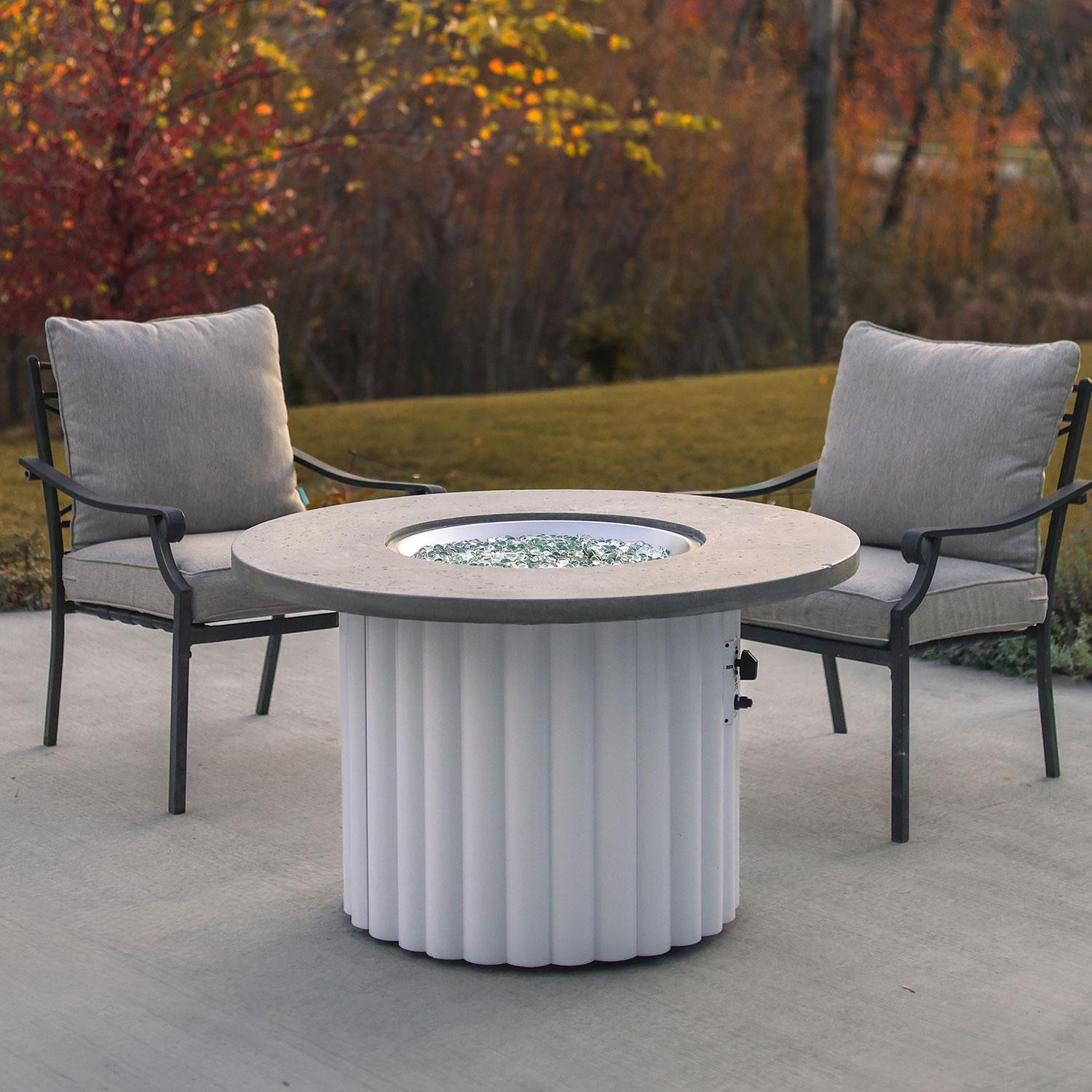 Reverie 42-in Round Aluminum Natural Gas Fire Pit Table in Relic Grey Supercast Table Top & White Base (Ships Propane w/ Conversion Kit) by The Outdoor GreatRoom Company