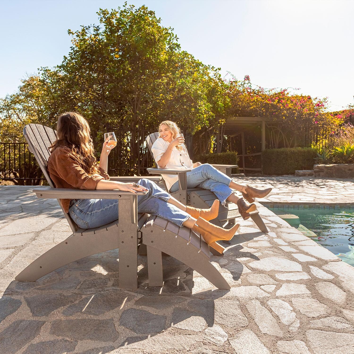 POLYWOOD Modern Slate Grey Curveback Adirondack Chair - Lounging By The Pool - Lifestyle thumbnail