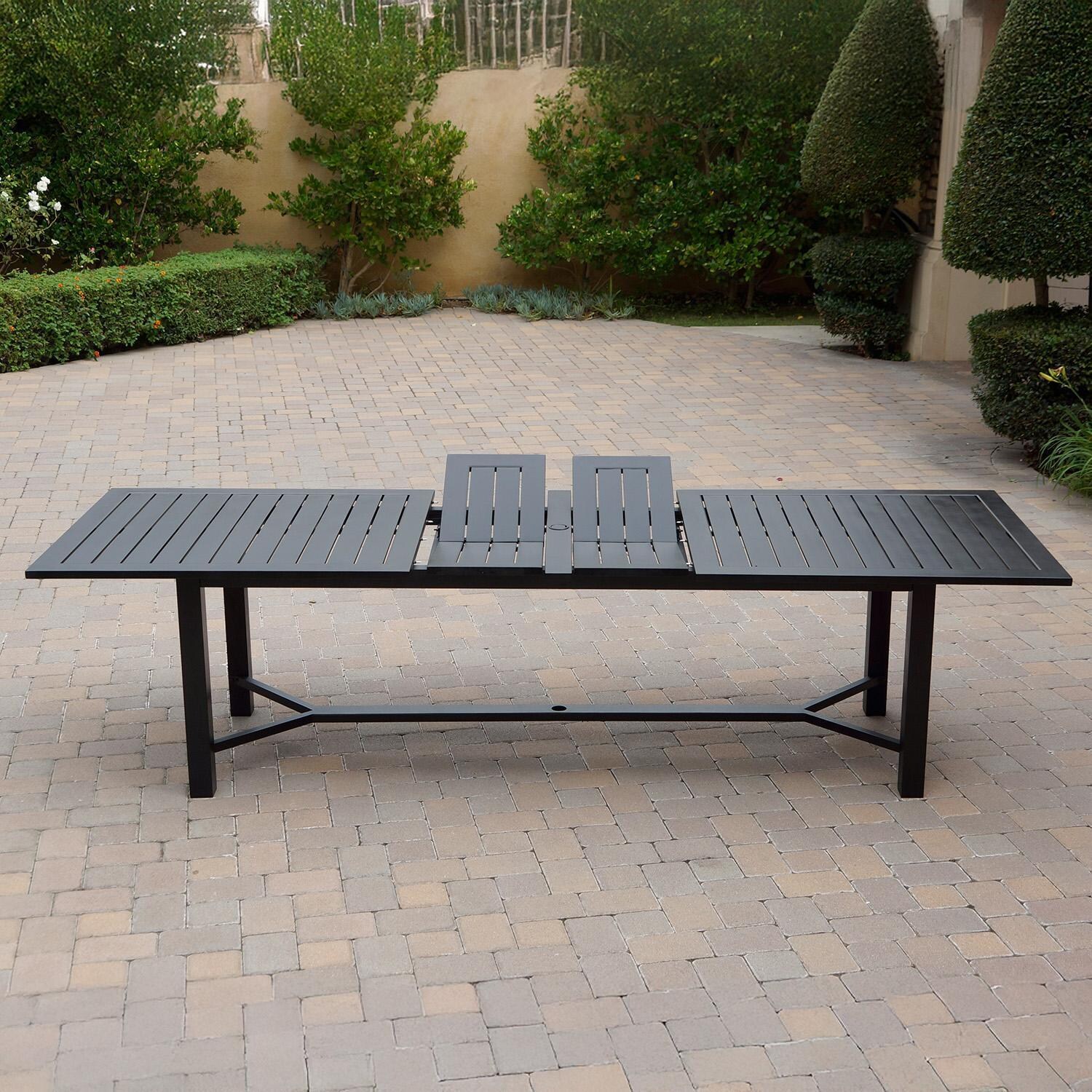 Darlee B/DL13-11PCD-2350LE-N Nassau 11 Pc Cast Aluminum Dining Set in Antique Bronze w/ Navy Cushions - Table Side View w/ Extension - Lifestyle thumbnail