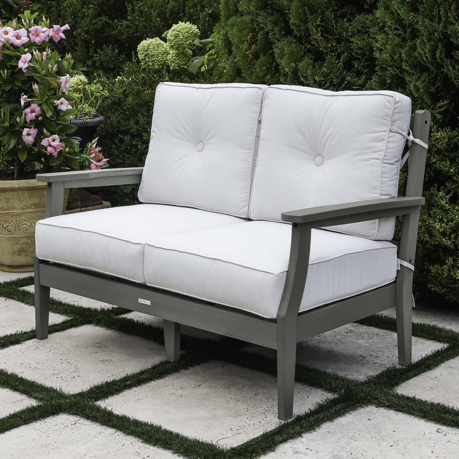 Blushing Bay 2 Person Recycled Plastic Loveseat in Bliss Linen/Coastal Teak by Lakeview Outdoor Designs - Right Angled - Lifestyle thumbnail