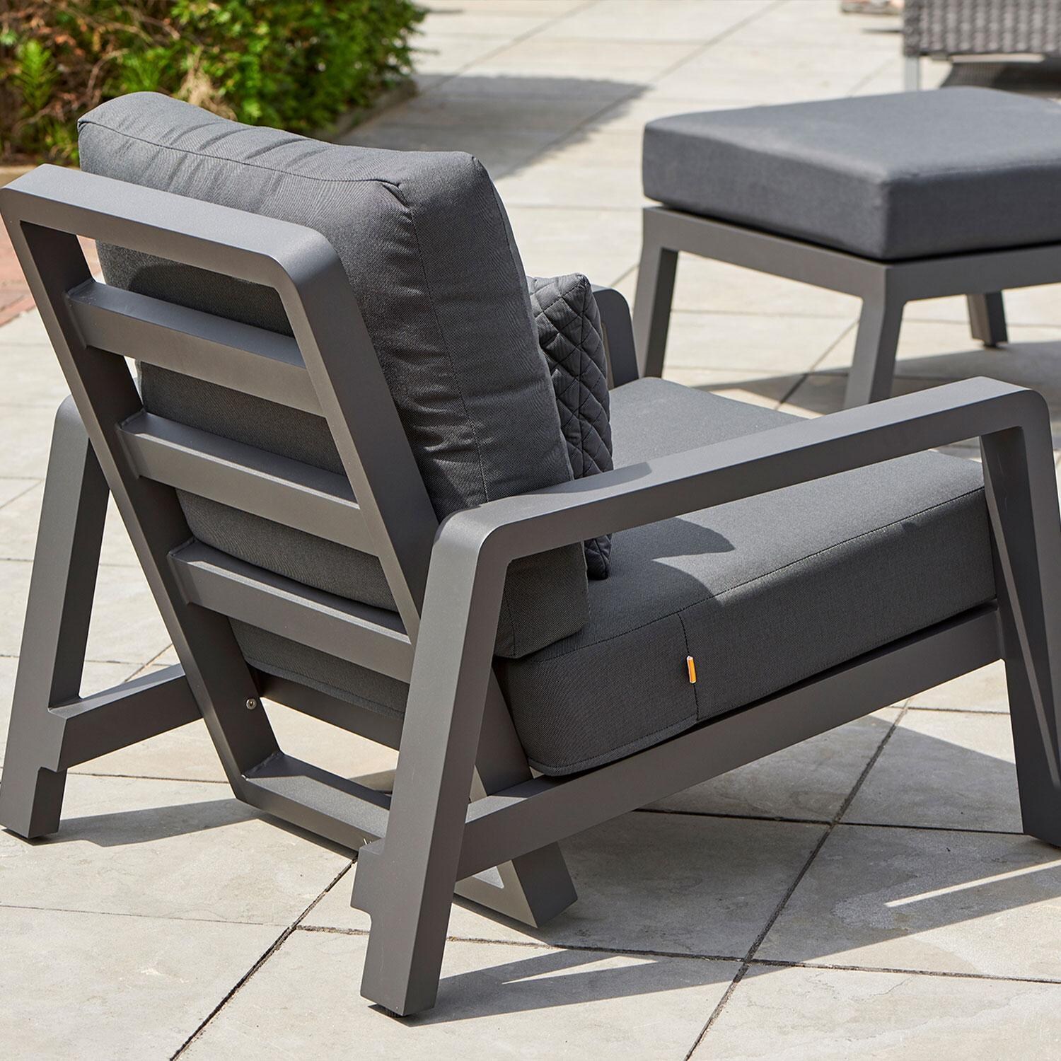 Boston Select Aluminum Reclining Lounge Chair in Lava By KETTLER - Side View - Lifestyle thumbnail