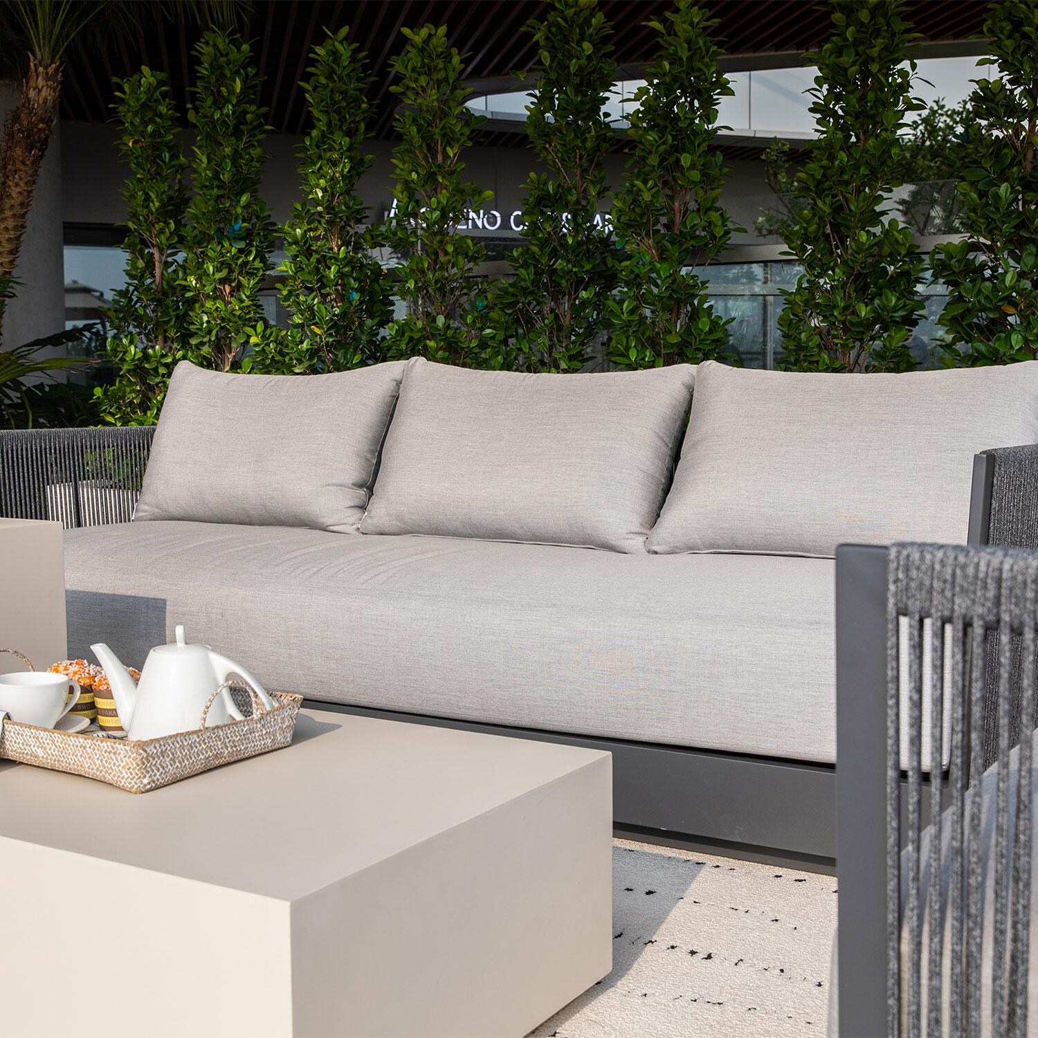 Elementi OS-2503T Capri Outdoor Aluminum Sofa w/ w/ Sunbrella Cushions - Patio - Angled - Lifestyle thumbnail