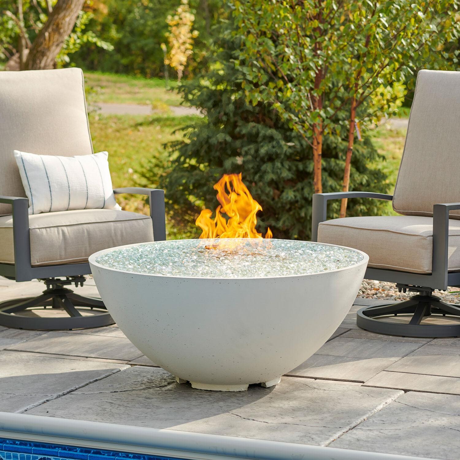 Cove Edge 42 Inch Round GFRC Propane Fire Bowl w/ Electronic Ignition in White by The Outdoor GreatRoom Company - Lifestyle thumbnail