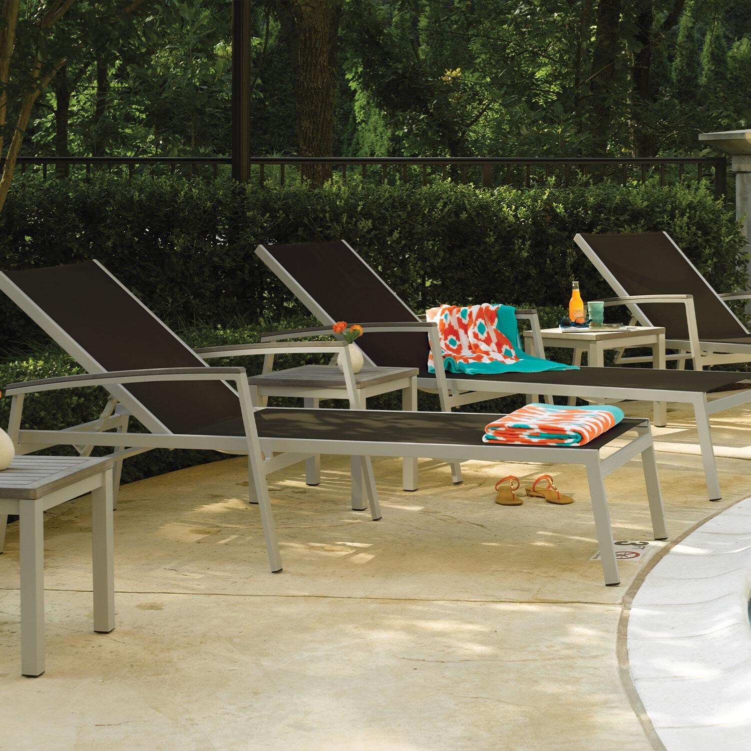 Travira 8 Pc Powder-Coated Aluminum Chaise Lounge Set in Black/Vintage/Flint By Oxford Garden - Close Up - Lifestyle thumbnail
