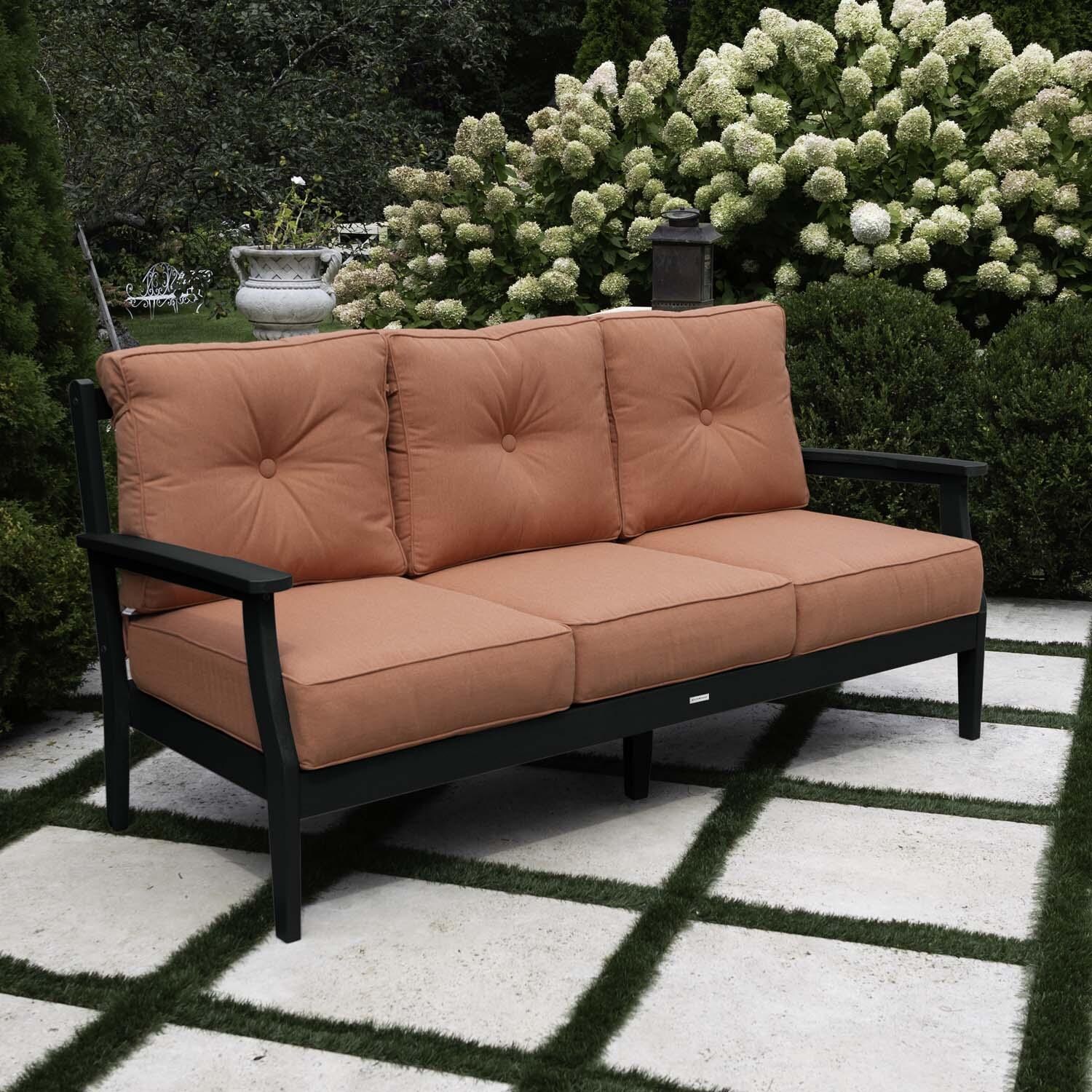 Blushing Bay 3 Person Recycled Plastic Sofa in Canvas Persimmon/Black by Lakeview Outdoor Designs - Left Angled - Lifestyle thumbnail