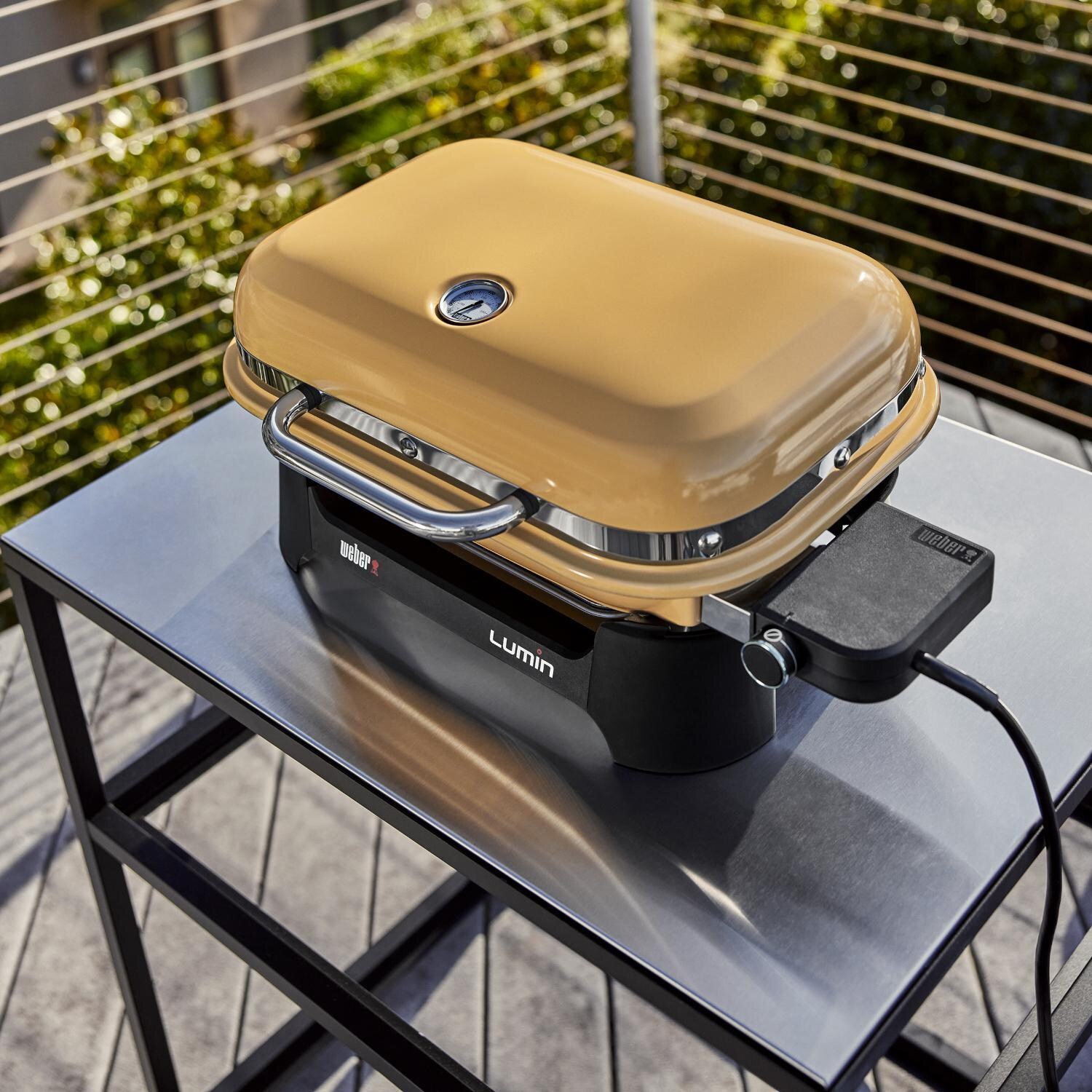 Weber 91280901 Golden Yellow Lumin Compact Portable 1560 Watt Electric Grill - Overhead View - Lifestyle thumbnail