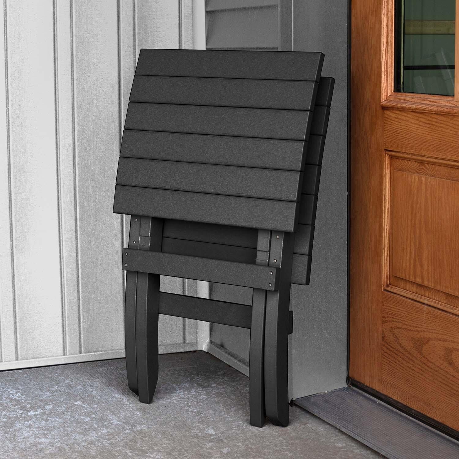 Hazel Cove Recycled Plastic Folding & Stacking Dining Side Chair in Black Sand by Lakeview Outdoor Designs - Folded - Lifestyle thumbnail