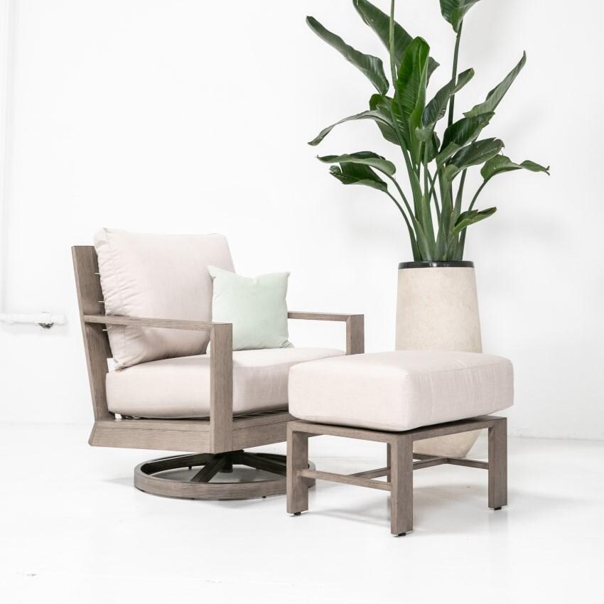 Laguna Aluminum Swivel Rocker Club Chair w/ No Welt in Driftwood/Canvas Natural by Sunset West - W/ Ottoman in Canvas Skyline - Lifestyle thumbnail