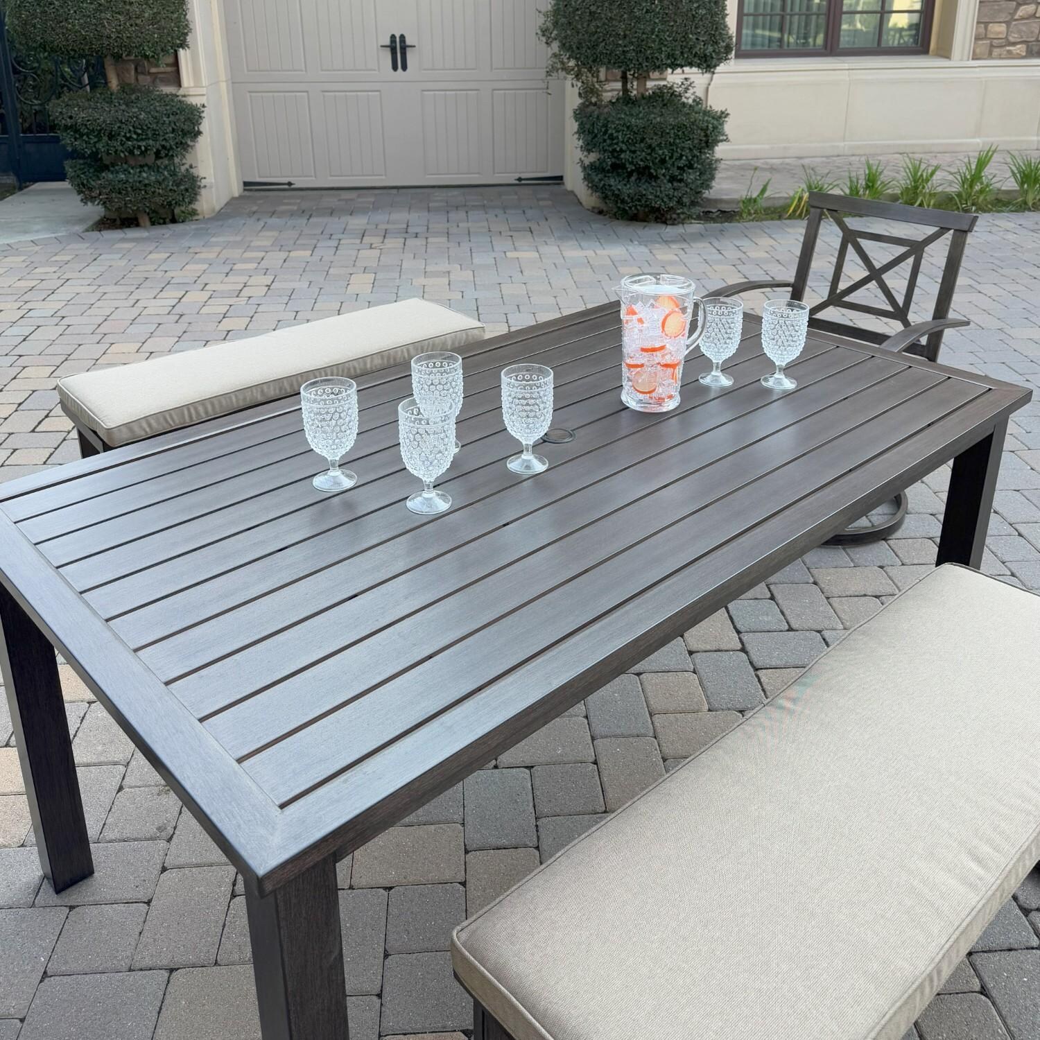 Atlantis 5 Pc Aluminum Dining Set w/ 2 Swivel Rocker Dining Arm Chairs & 2 Two Person Benches in Walnut/Beige by Darlee - Angled Table - Lifestyle thumbnail