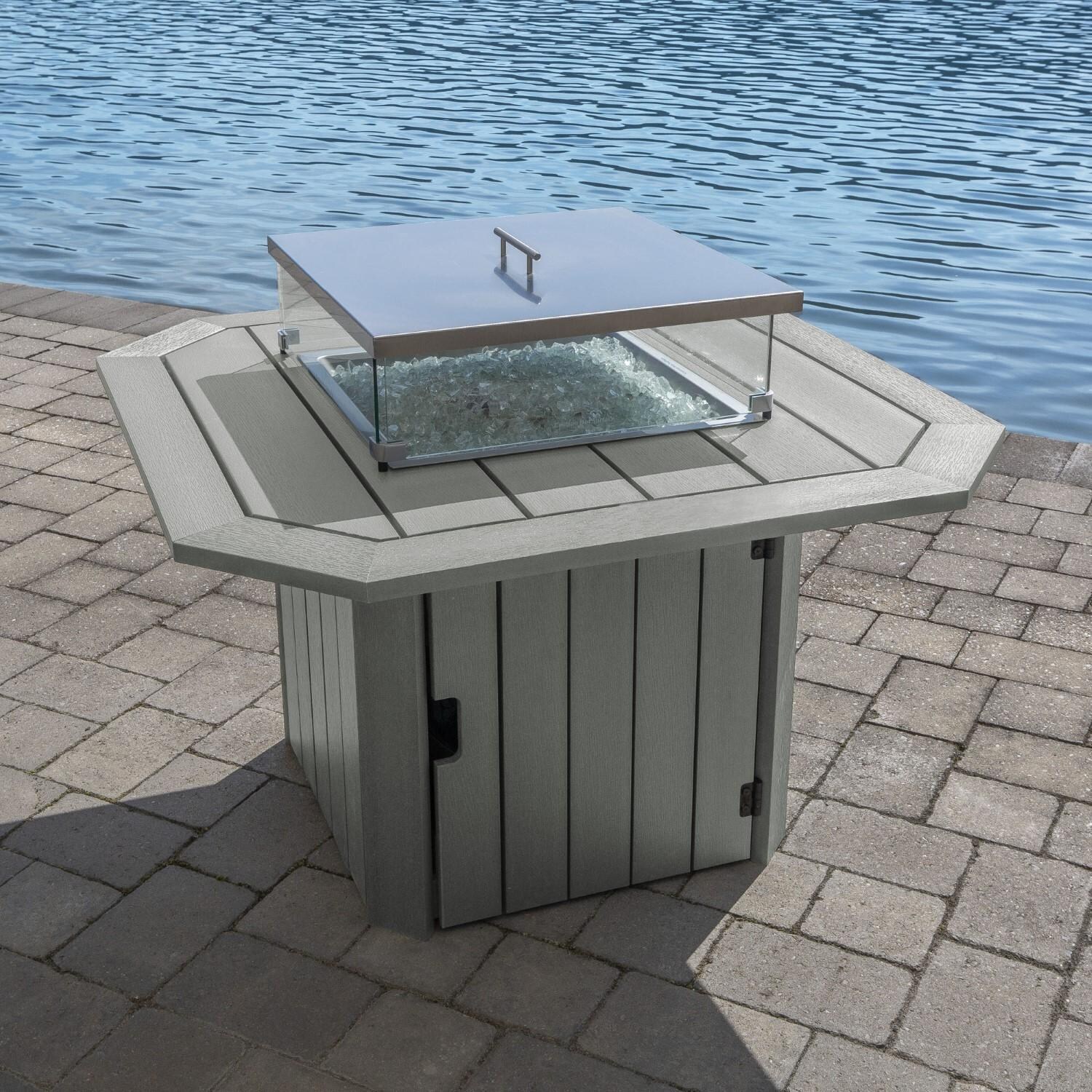 Harborview Octagonal Fire Pit Table in Coastal Teak by Lakeview Outdoor Designs - Off W/ Lid - Lifestyle thumbnail