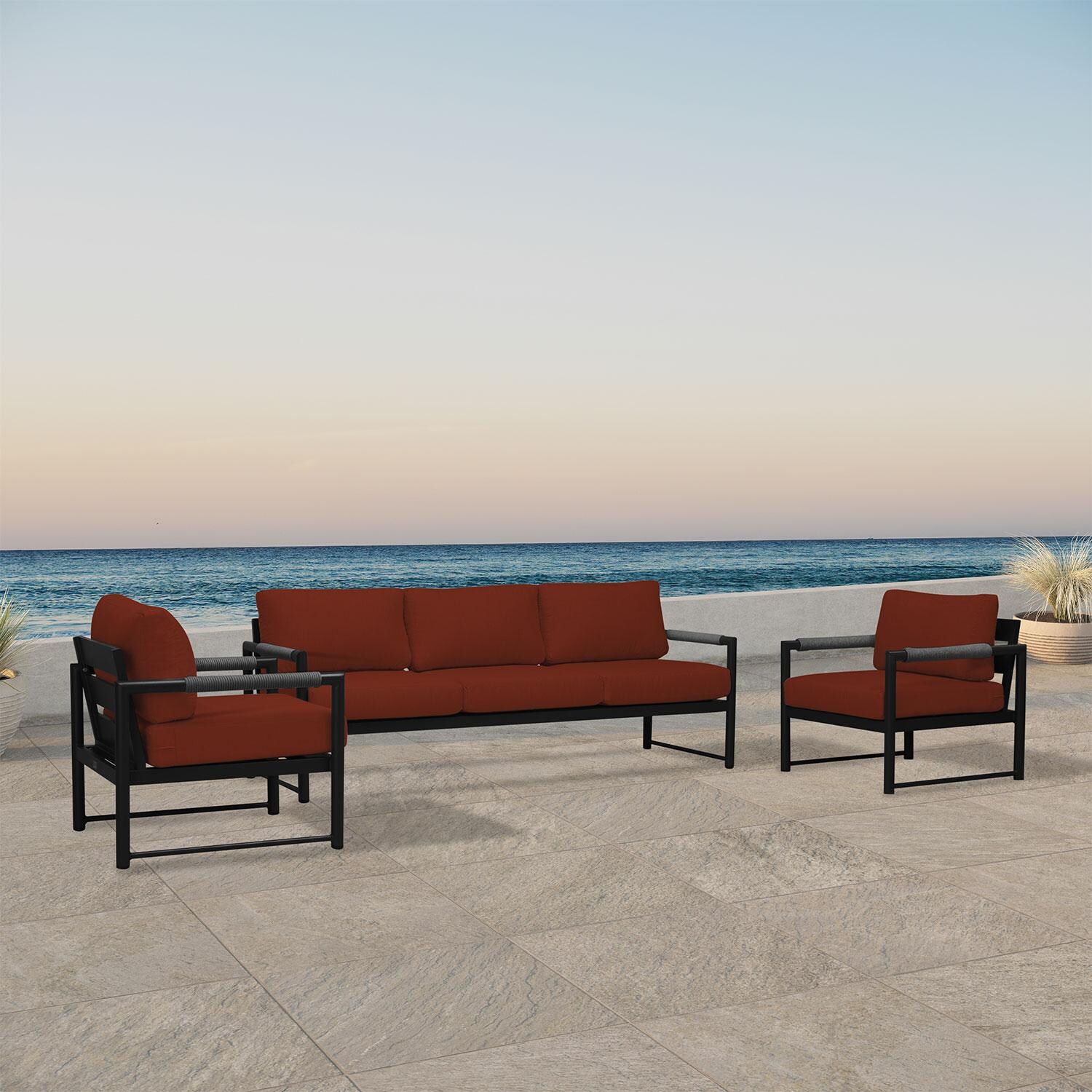 Lakeview AVEBAY-BK-CO-SET141-HN Avenue Bay Black/Carbon 3 Pc Sofa Club Chair Set - Canvas Henna - Angled On Patio - Lifestyle thumbnail