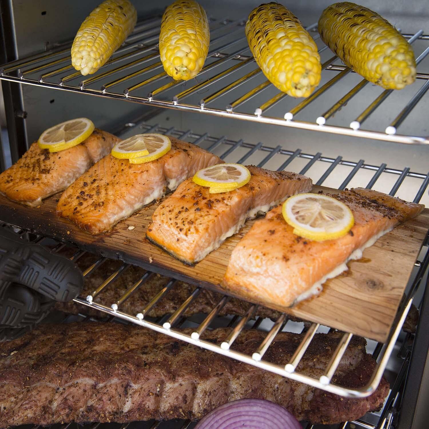 Broil King 28-Inch Smoke Vertical Charcoal Smoker - Black - Corn and Fish - Lifestyle thumbnail