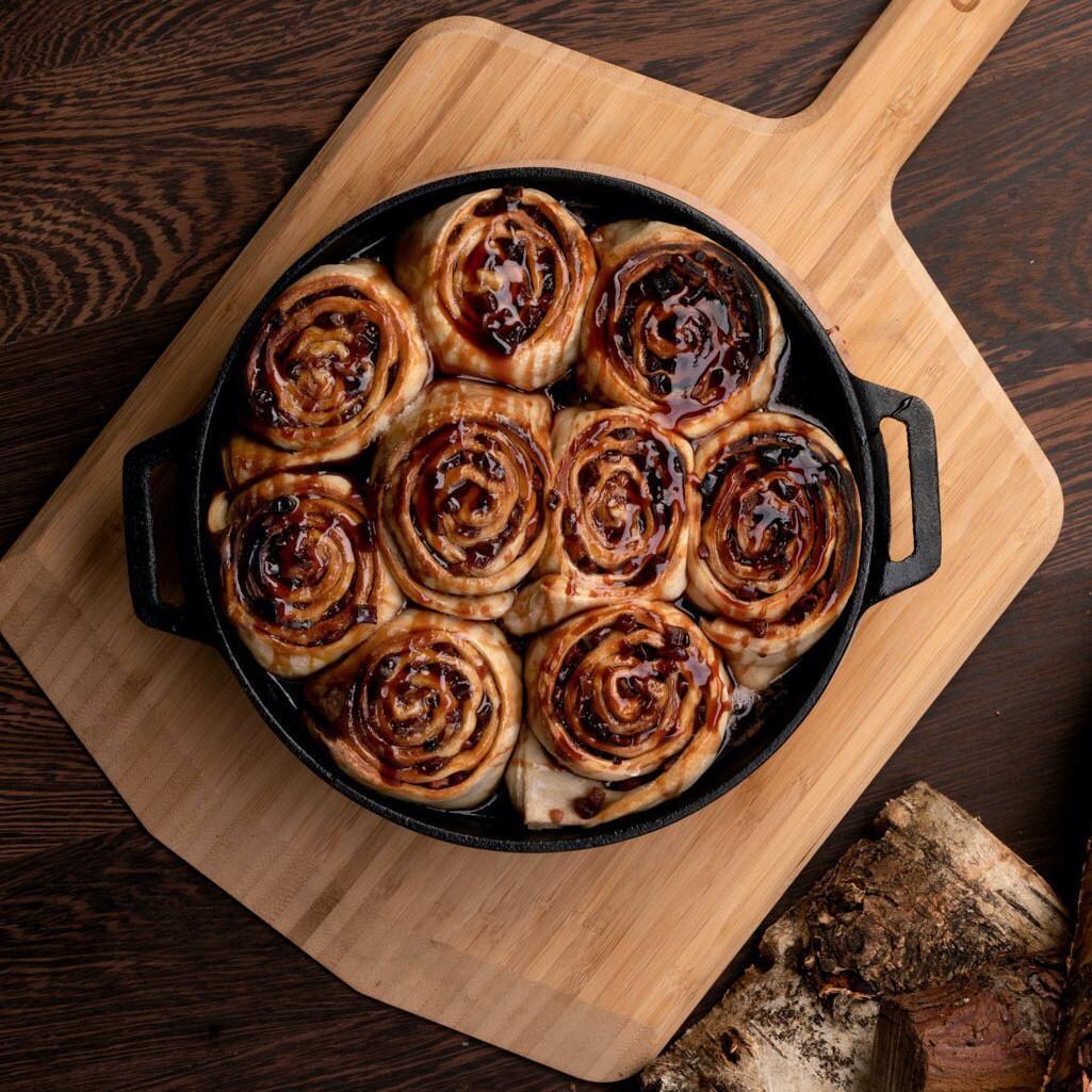 Ooni - UU-P08300 - 14-Inch Bamboo Pizza Peel & Serving Board - Serving Fresh Cinnamon Rolls thumbnail