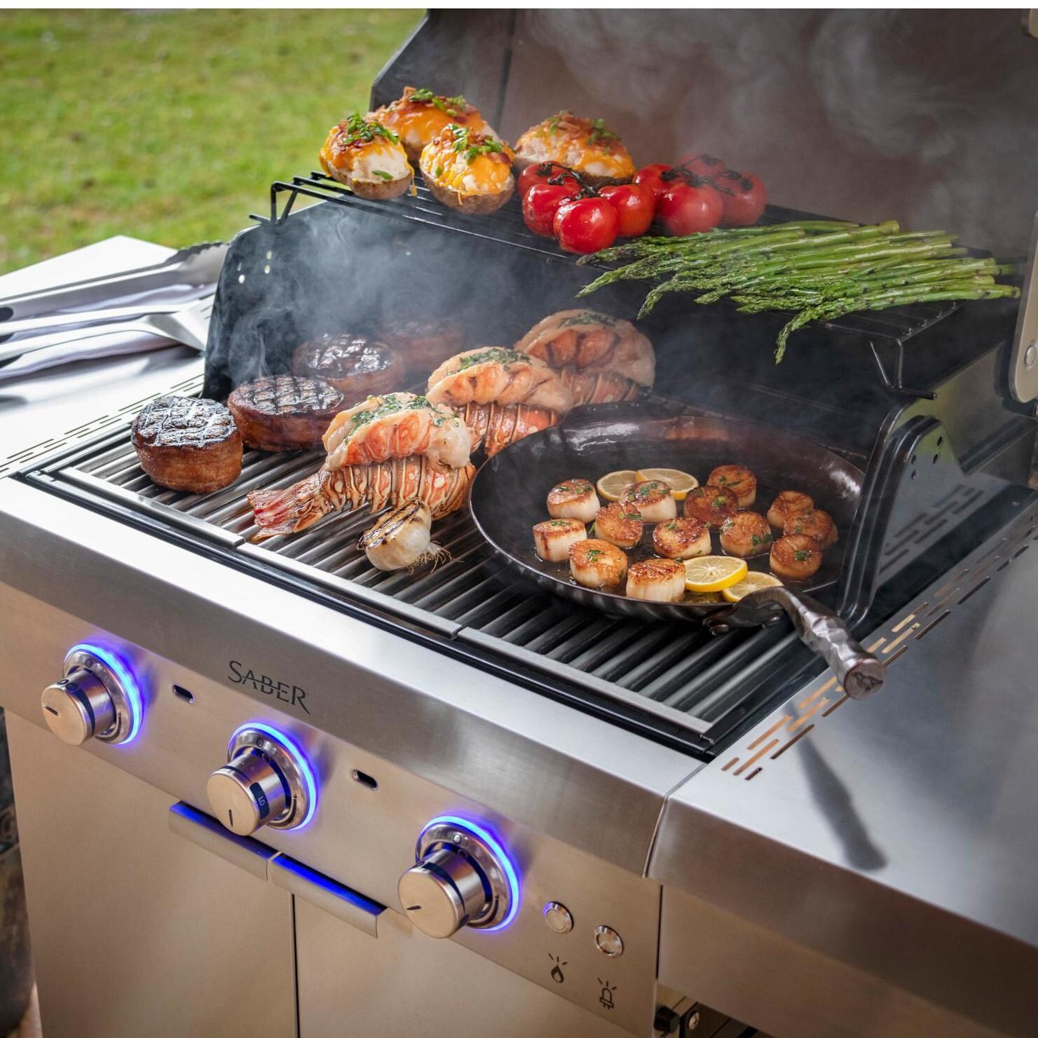 Saber Select R42SC0321 3-Burner 24-Inch Infrared Propane Gas Grill - Skillet in use thumbnail