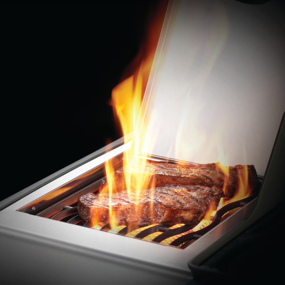 Napoleon RXT425SIBNSS-1 Rogue XT 425 Natural Gas Grill with Infrared Side Burner - Stainless Steel - Searing Steak On The Sizzle Zone Side Burner thumbnail