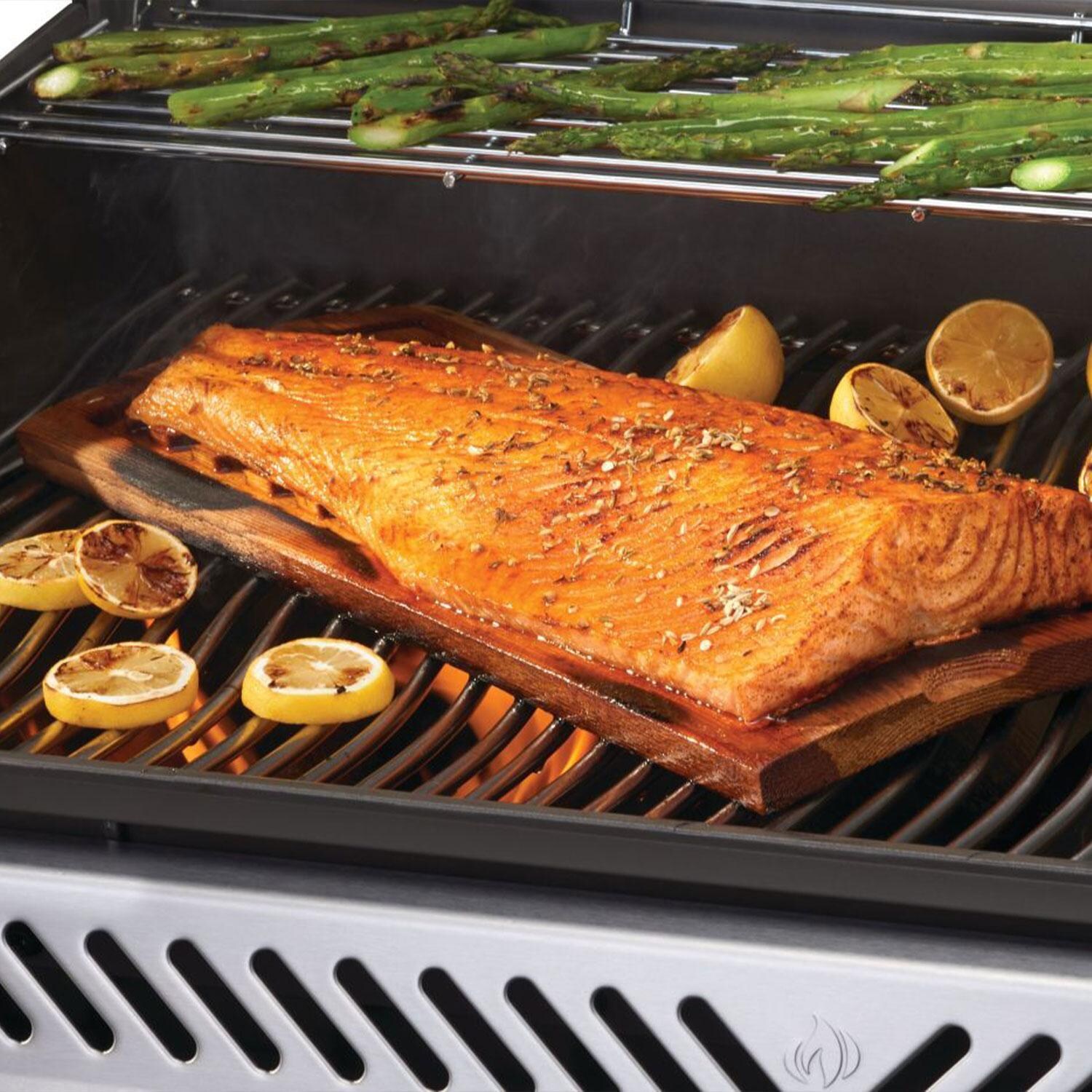 Napoleon RP625SIBNSS-2 Rogue PRO 625 Propane Gas Grill w/ Infrared Side Burner - Stainless Steel - Grilling Salmon - Lifestyle thumbnail