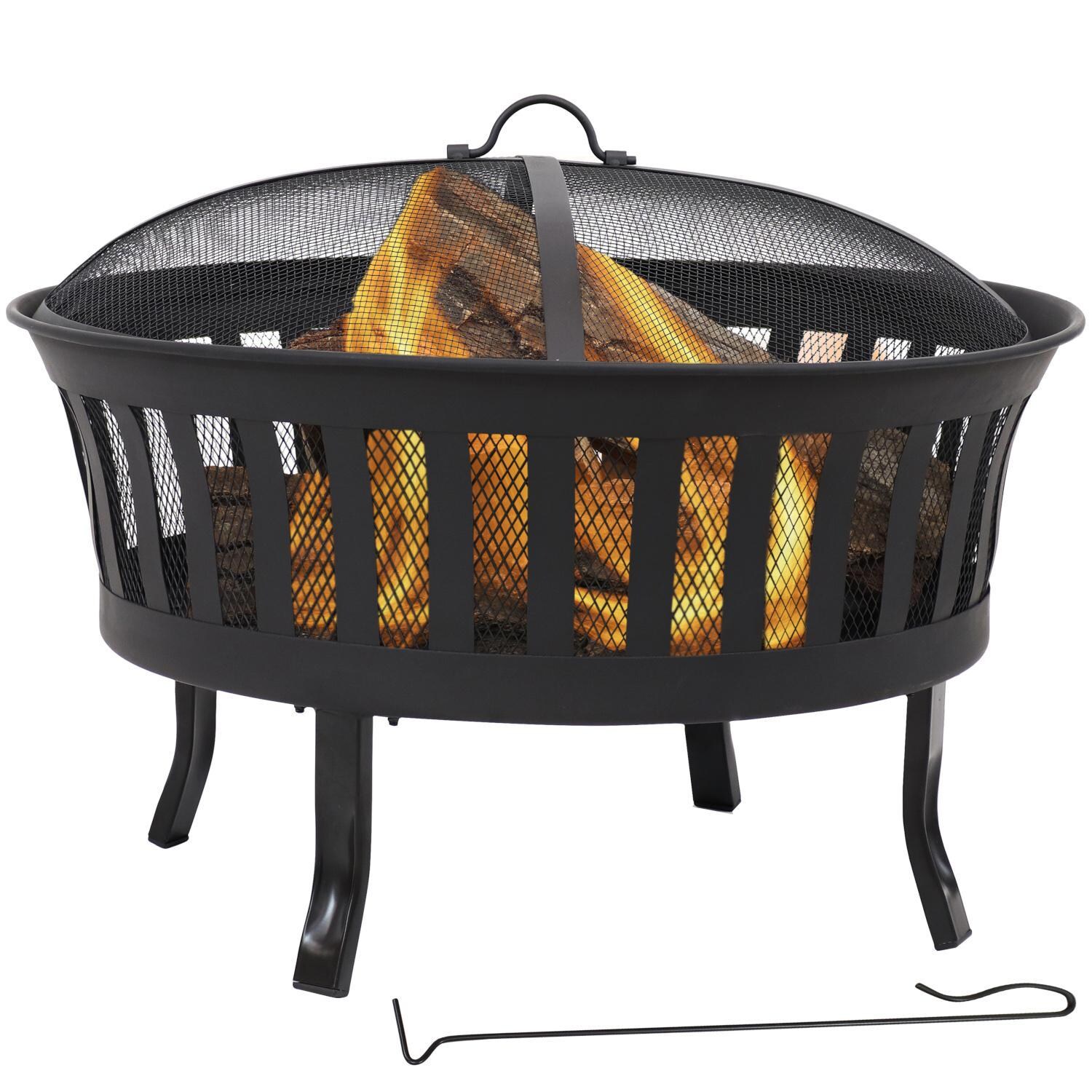 Ultimate Patio 25-Inch Steel Stripe Cutout Wood Burning Fire Pit - In Use thumbnail