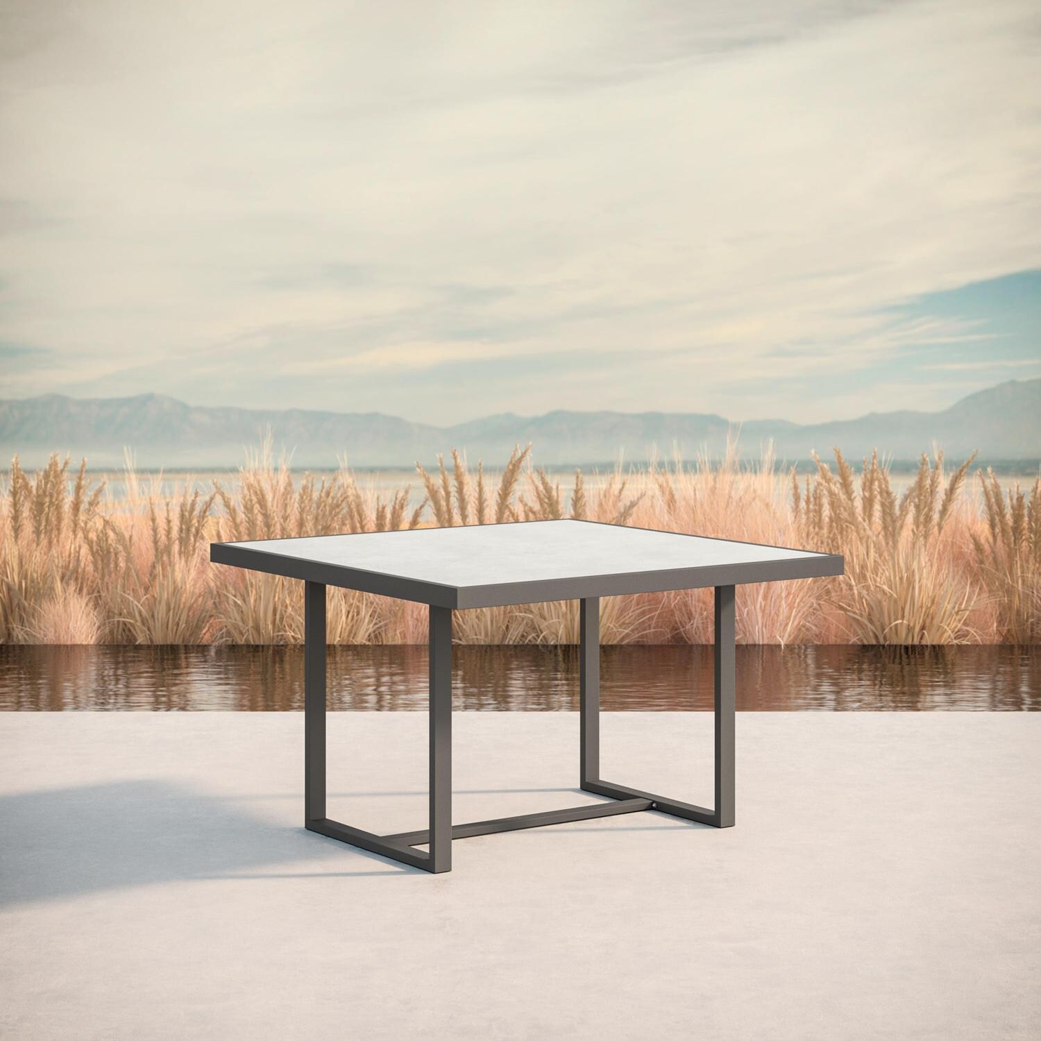 Azzurro Living Pavia 48 Inch Charcoal Aluminum Dining Table W/ Helena Dekton Top - Lifestyle thumbnail