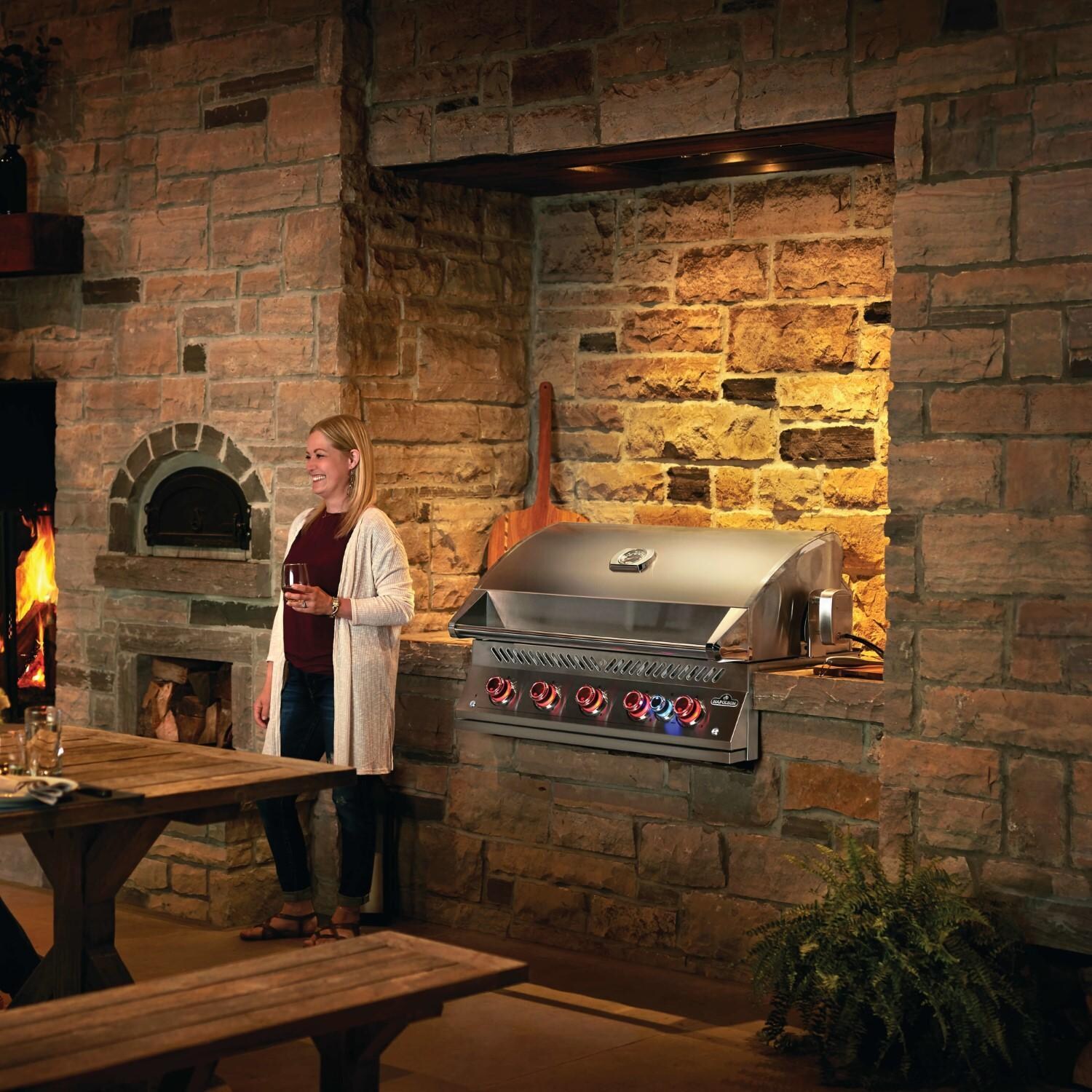 Napoleon BIG38RBPSS-1 Propane Grill - Standing By Fireplace - Lifestyle thumbnail