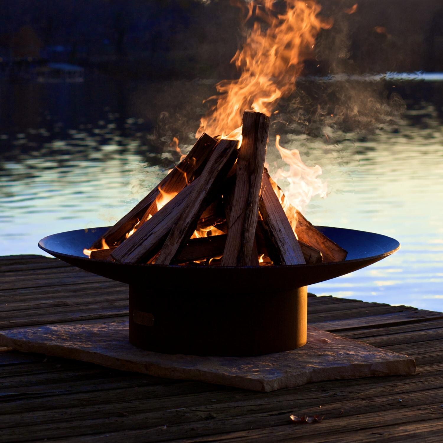 Fire Pit Art Asia Wood Burning Fire Pit - Shown with Fire at Night thumbnail