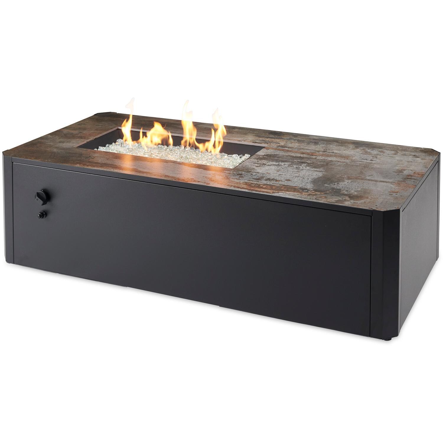 The Outdoor GreatRoom Company Kinney KN-1224-NG 55-Inch Rectangular Natural Gas Fire Pit Table with 24-Inch Crystal Fire Burner - Ships As Propane With Conversion Fittings - Shown With Burner Lit thumbnail