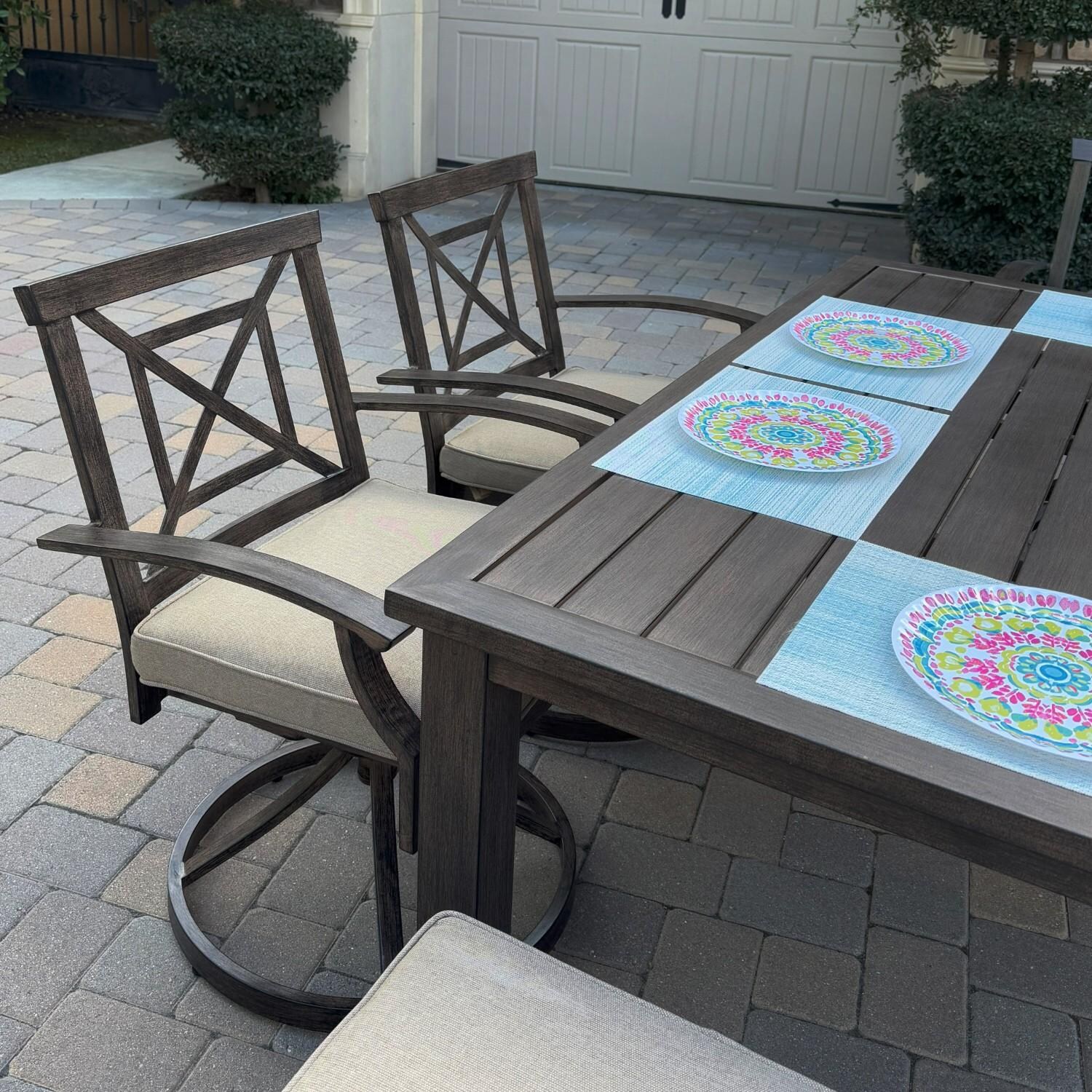 Atlantis 8 Pc Aluminum Dining Set w/ 6 Swivel Rocker Dining Arm Chairs & Two Person Bench in Walnut/Beige by Darlee - Chairs At Table - Lifestyle thumbnail