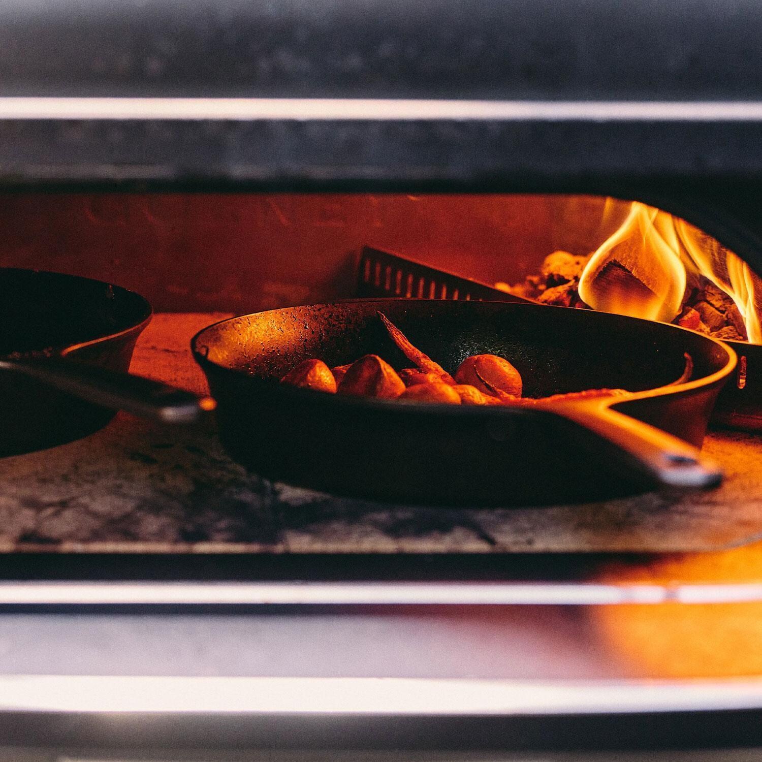 Gozney GMNOBUS1826 Dome XL Gen 2 Natural Gas Pizza Oven - Off Black - In Use - Lifestyle thumbnail