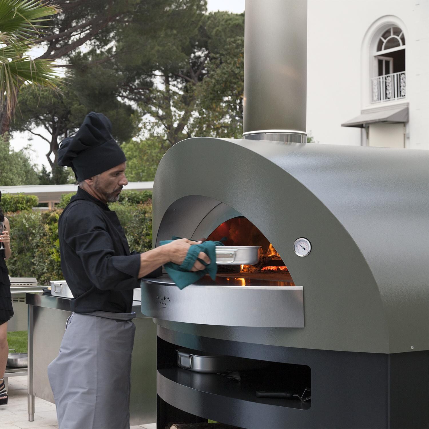 Alfa Pro Opera 47-Inch Outdoor Countertop Wood-Fired Pizza Oven - Lifestyle View (Oven Base Sold Separately) thumbnail