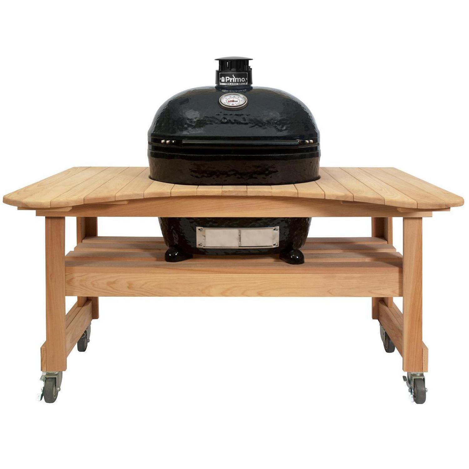 Primo PGCXLH Oval XL 400 Ceramic Kamado Grill On Curved Cypress Table With Stainless Steel Grates - White Background thumbnail