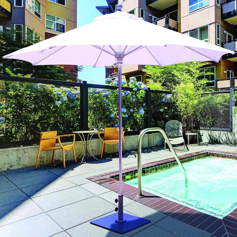 Galtech 9 Ft. Octagonal Patio Umbrella W/ Manual Lift - Lifestyle View - Shown In Silver Finish W/ Natural Sunbrella Fabric (Umbrella Base Not Included) thumbnail