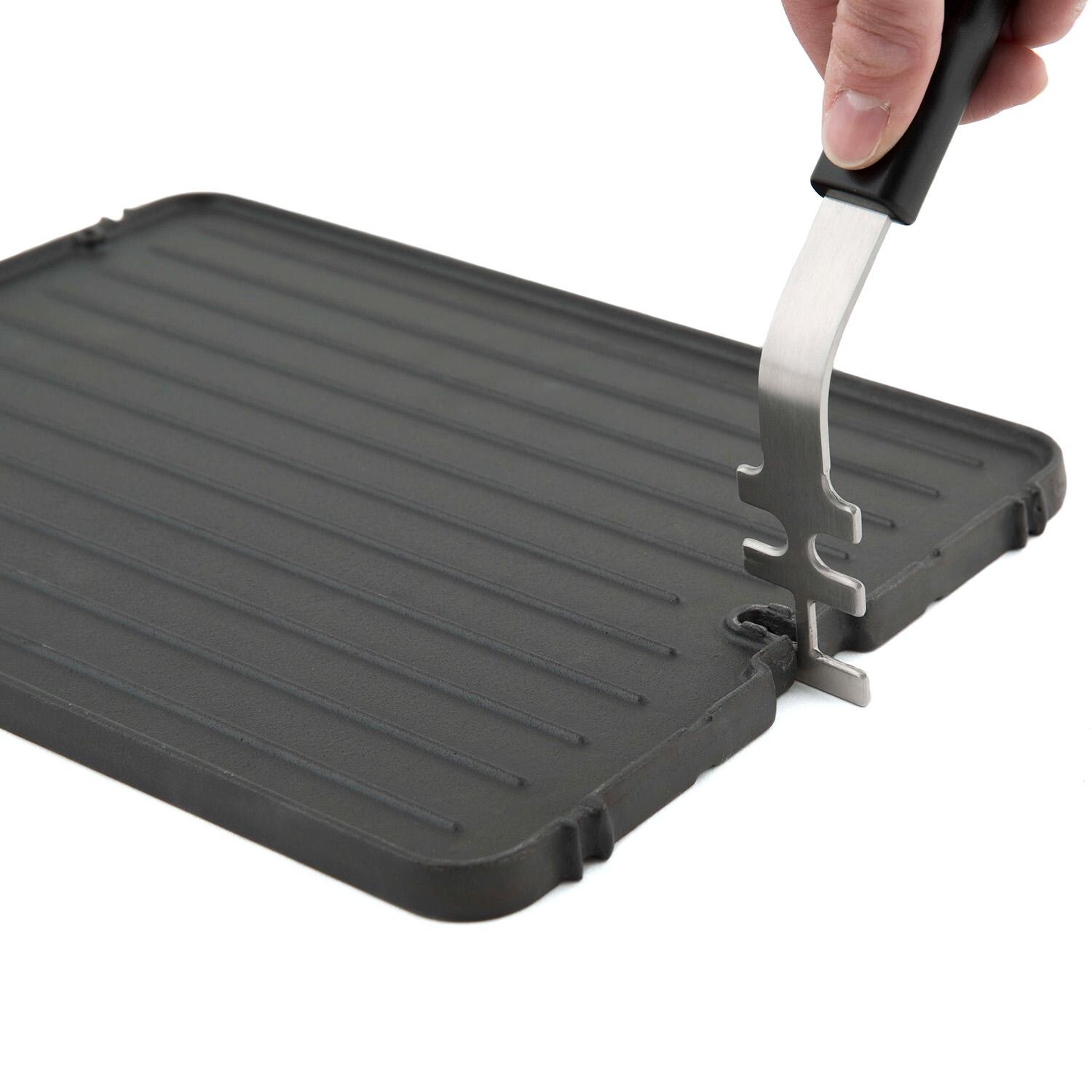 Broil King Cast Iron Porta-Chef Griddle - 11237 - Inserting Handle - White Background thumbnail