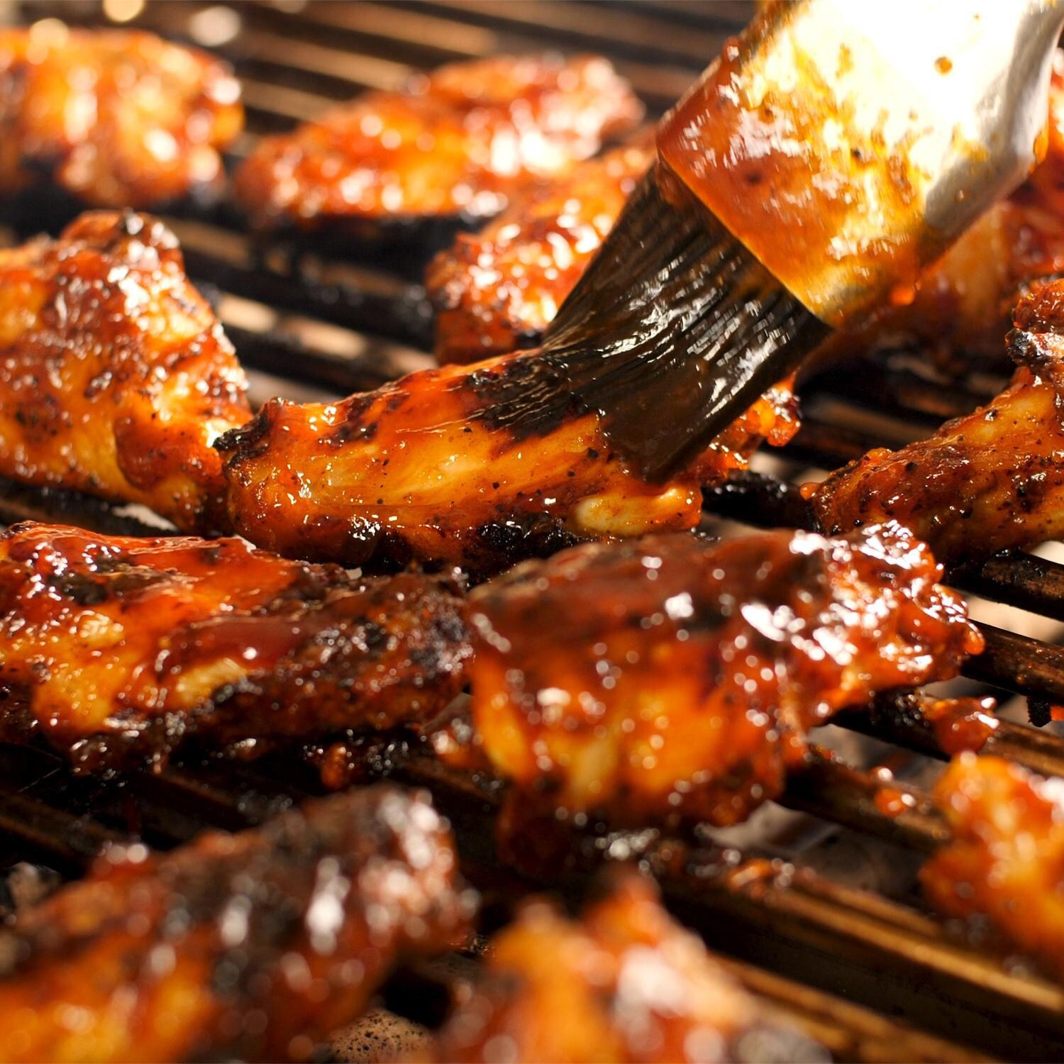 Lion 65623 L60000 32-Inch 4-Burner Stainless Steel Gas Grill - Basting Grilled Wings thumbnail