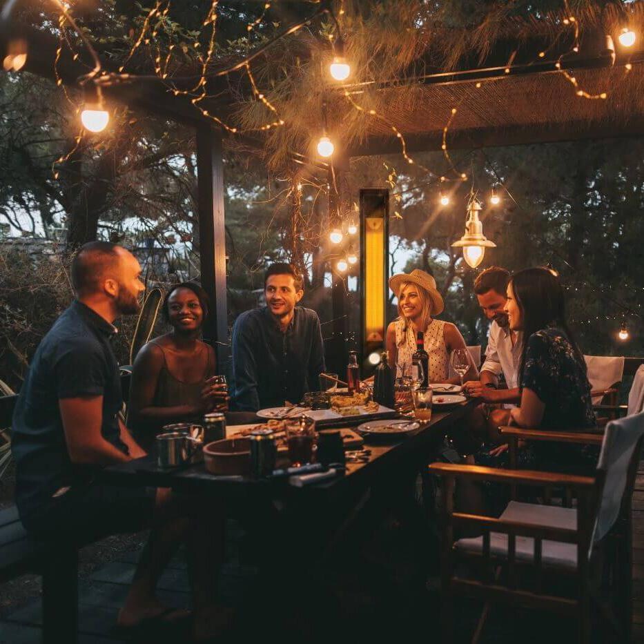 Napoleon NEOFV80IH Phantom Freestanding 1500W Electric Infrared Patio Heater - At Night - Lifestyle thumbnail