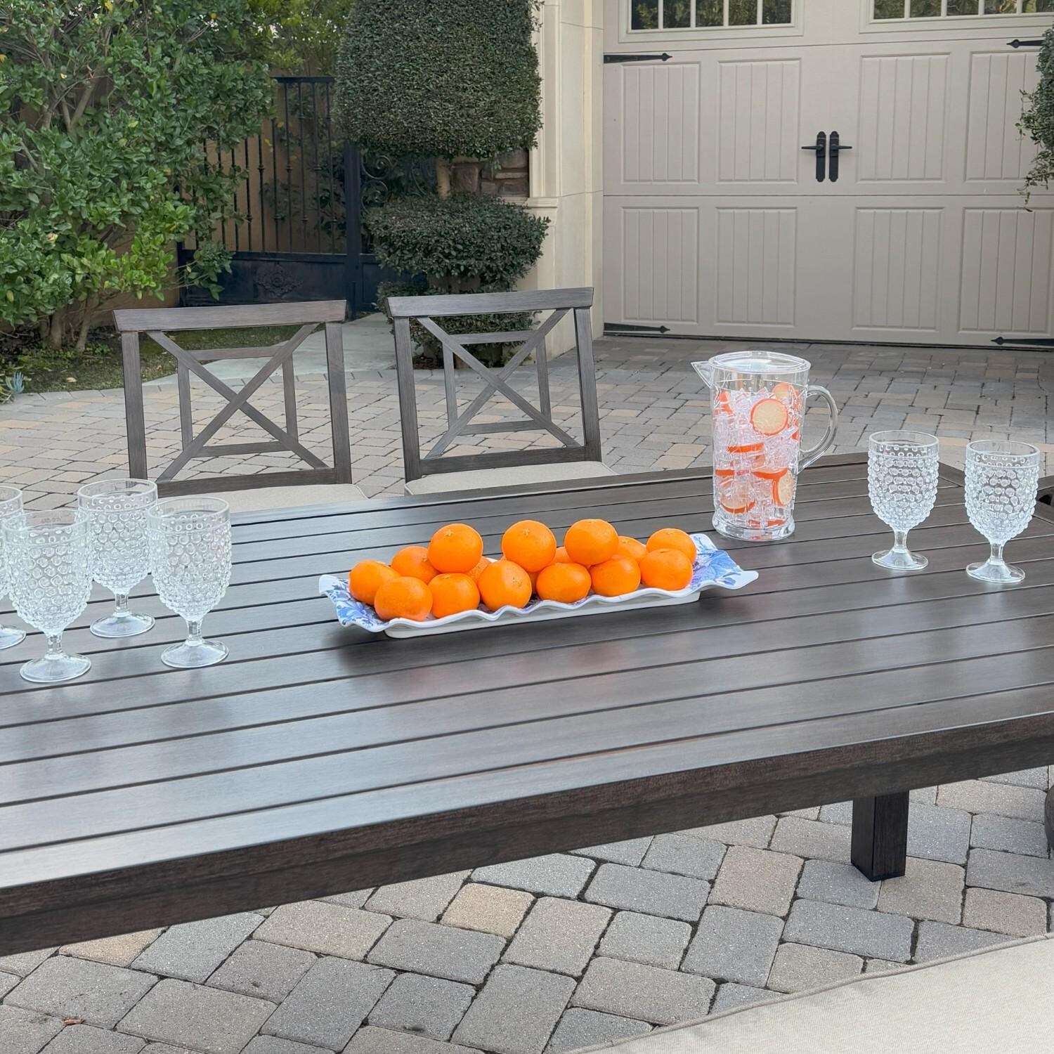 Atlantis 6 Pc Aluminum Dining Set w/ 2 Dining Side Chairs, 2 Swivel Rocker Dining Arm Chairs & Two Person Bench in Walnut/Beige by Darlee - Table Side - Lifestyle thumbnail