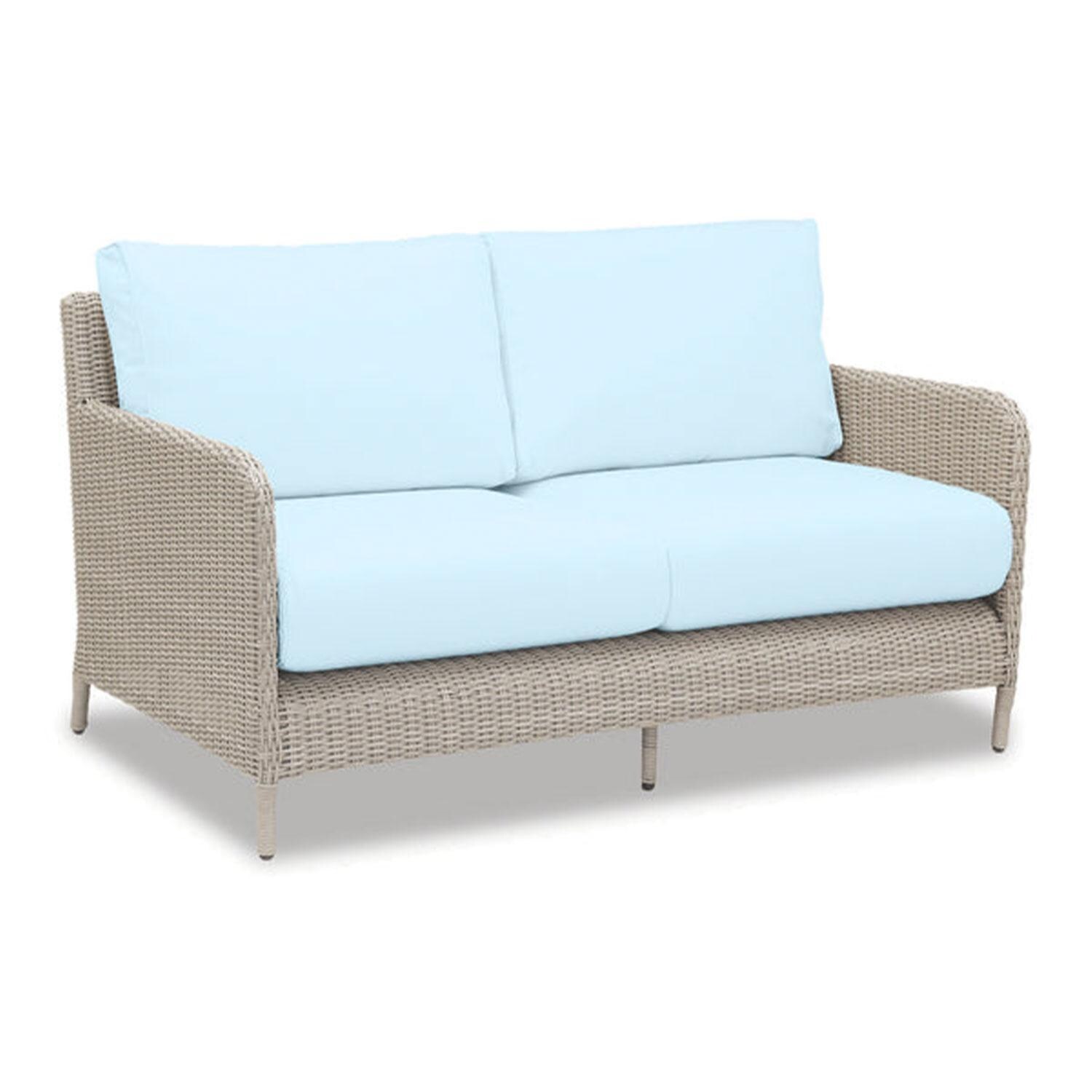 Manhattan Wicker Patio Loveseat in Canvas Skyline w/ Self Welt By Sunset West - Display - White Background thumbnail