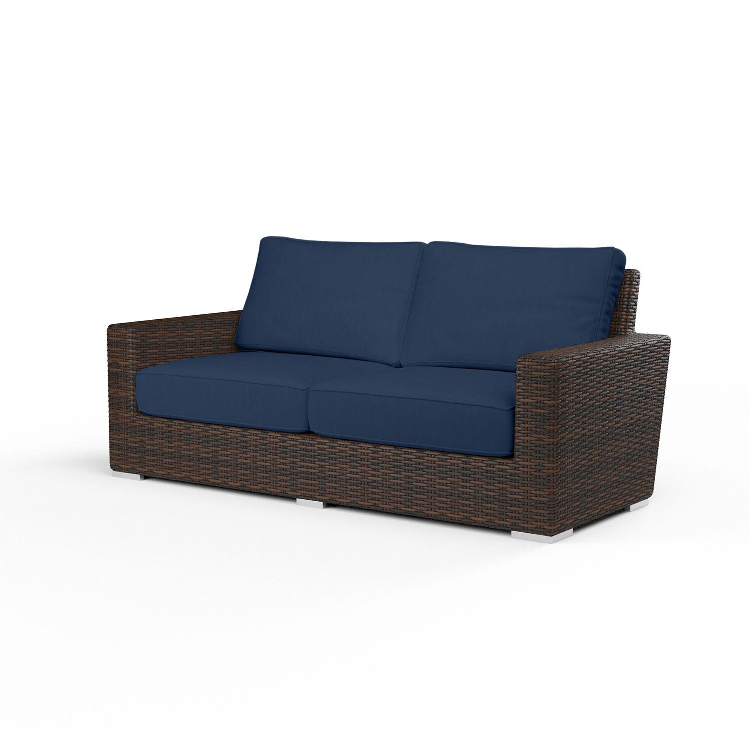 Montecito Wicker Patio Loveseat in Spectrum Indigo w/ Self Welt By Sunset West - Display - White Background thumbnail