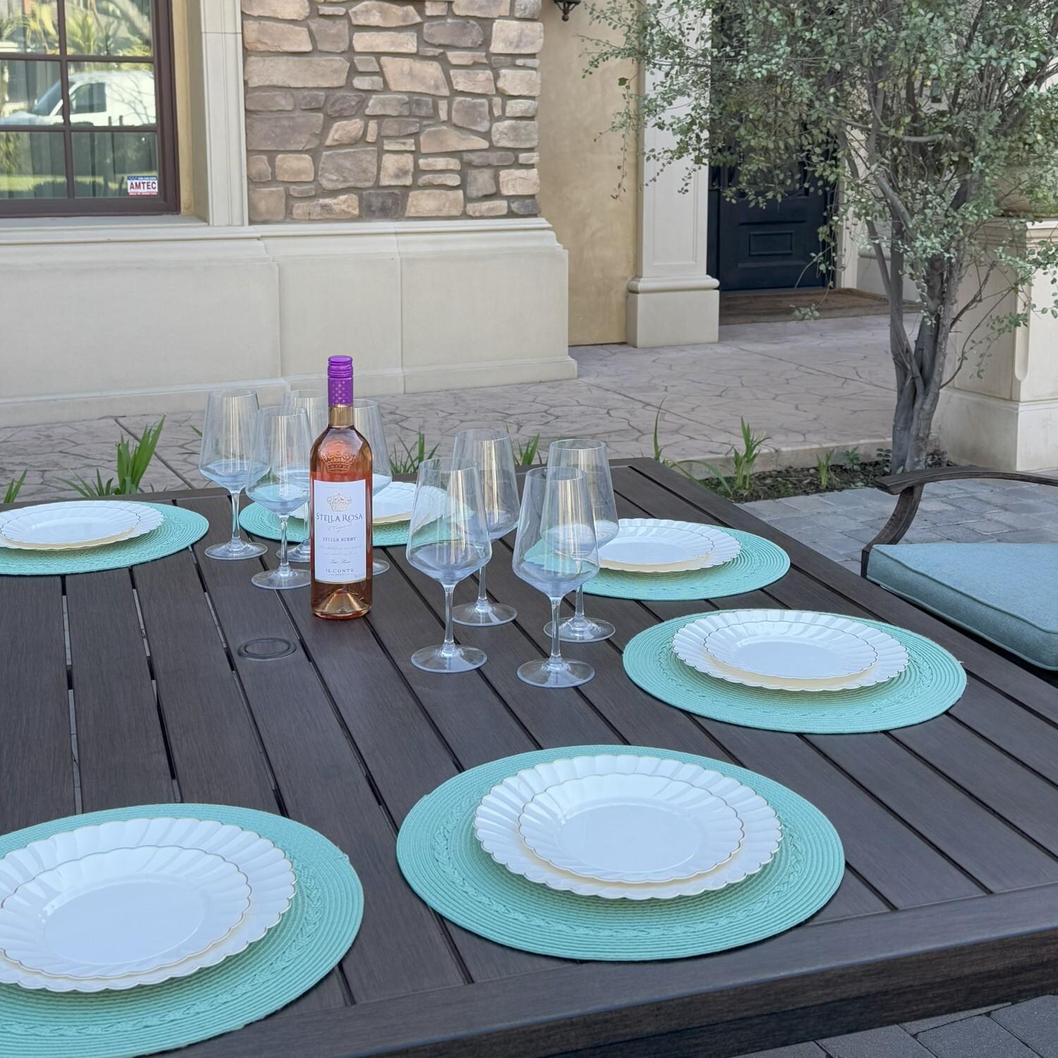 Atlantis 7 Pc Aluminum Dining Set w/ 4 Swivel Rocker Dining Arm Chairs & 2 Two Person Benches in Walnut/Spa by Darlee - Table Close-up - Lifestyle thumbnail