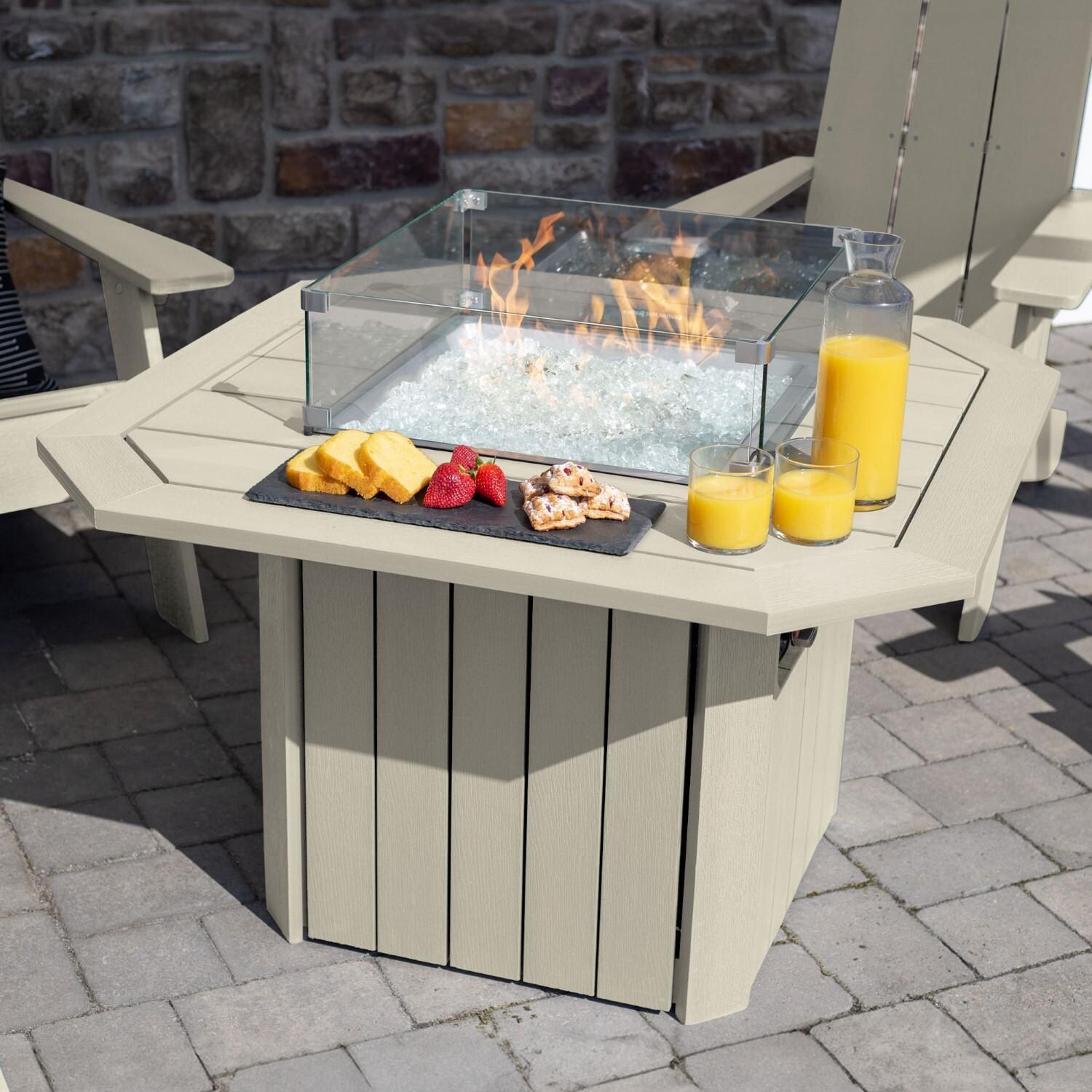 Harborview 5 Pc Adirondack Set W/ Fire Pit Table in Whitewash by Lakeview Outdoor Designs - Angled Table View - Lifestyle thumbnail