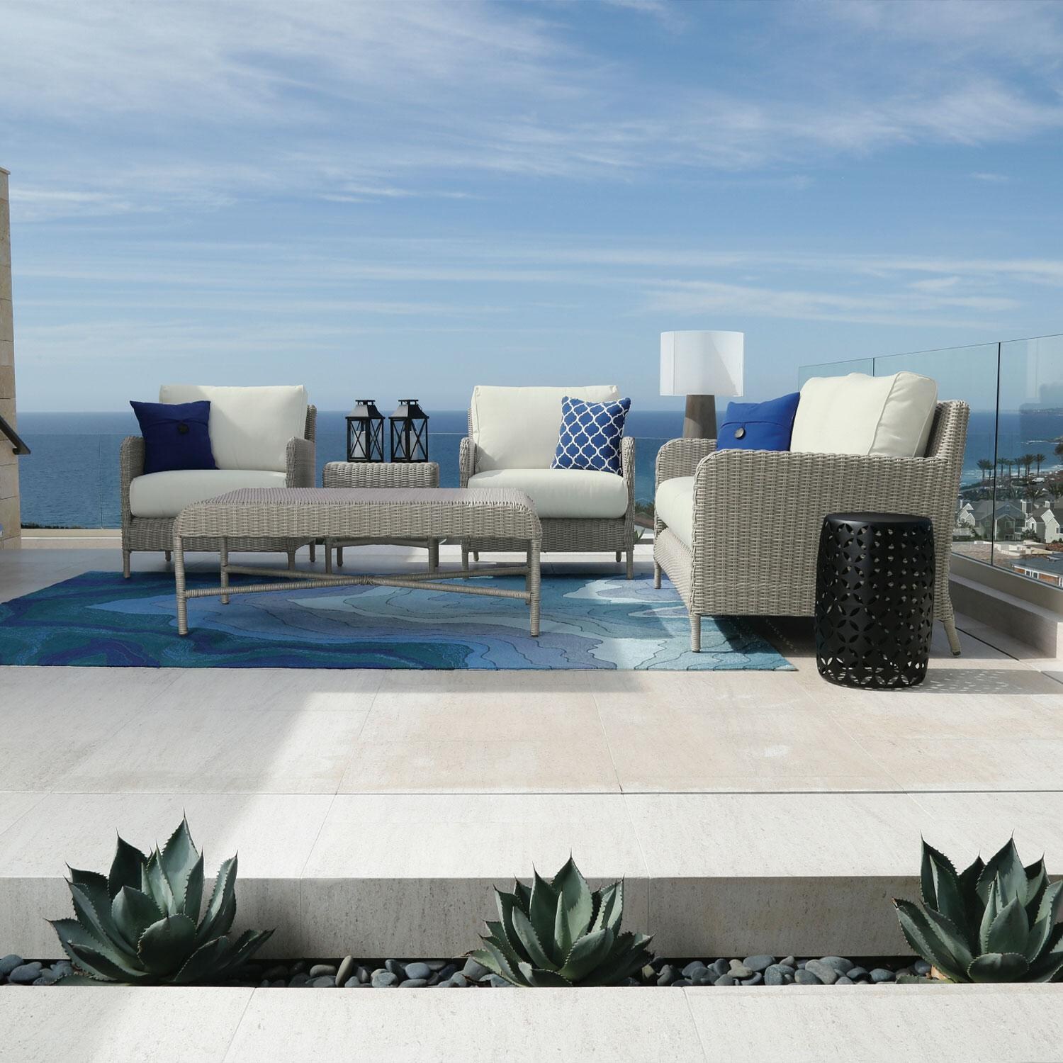 Manhattan Wicker Patio Sofa in Canvas Skyline w/ Self Welt By Sunset West - Balcony - Styled W/ Furniture Shown in Canvas Flax (Only Sofa Included) - Lifestyle thumbnail